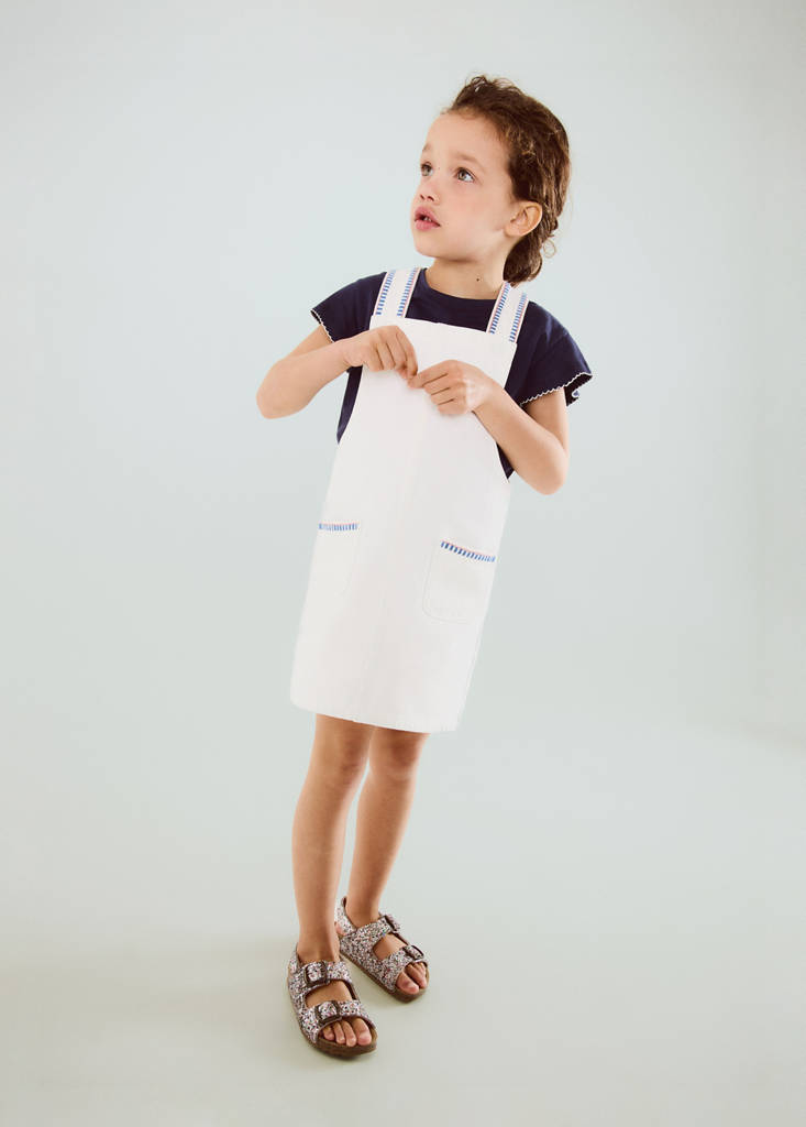 Pinafore with embroidered details — White