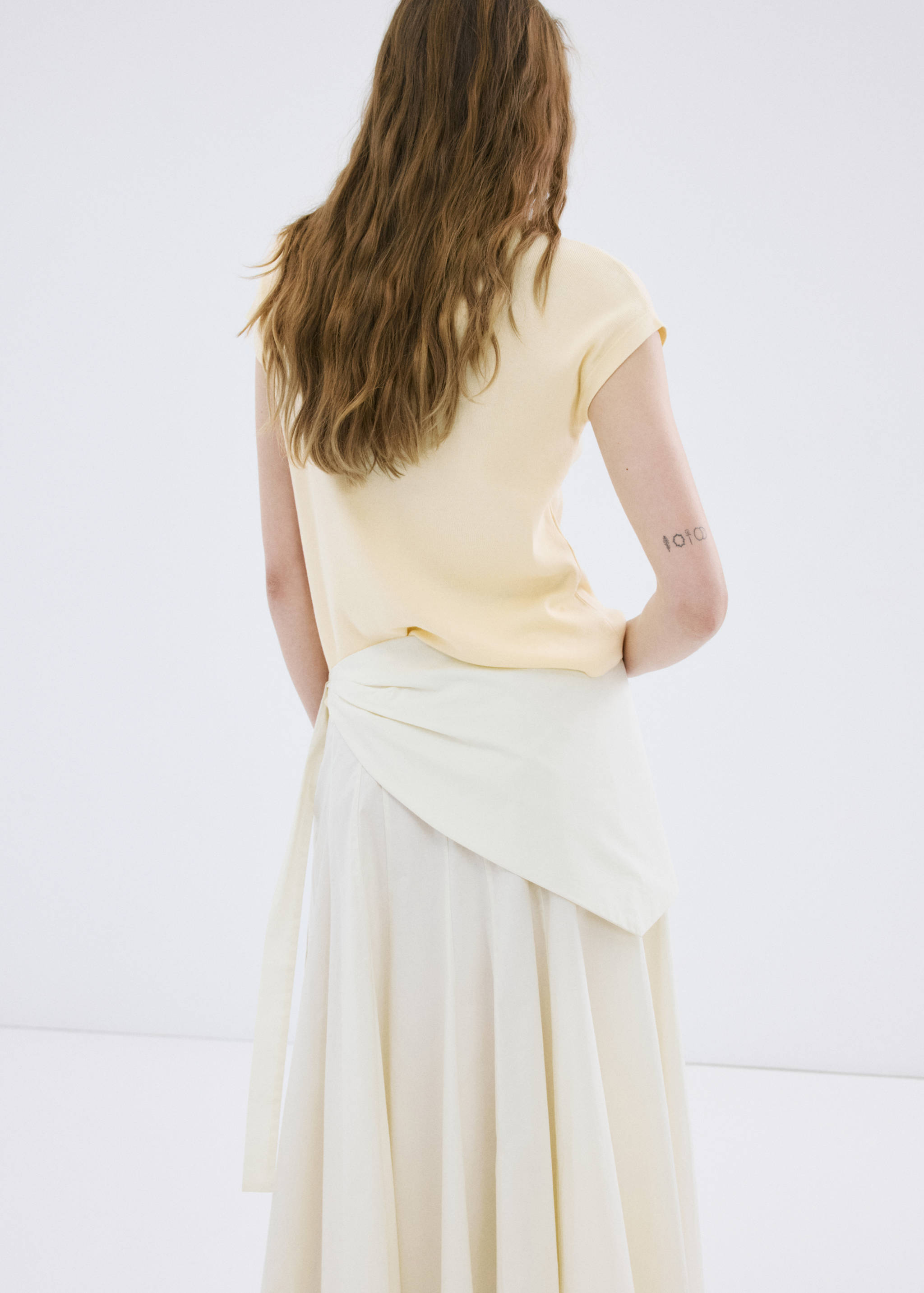 Short-sleeved knitted cotton sweater - Reverse of the article