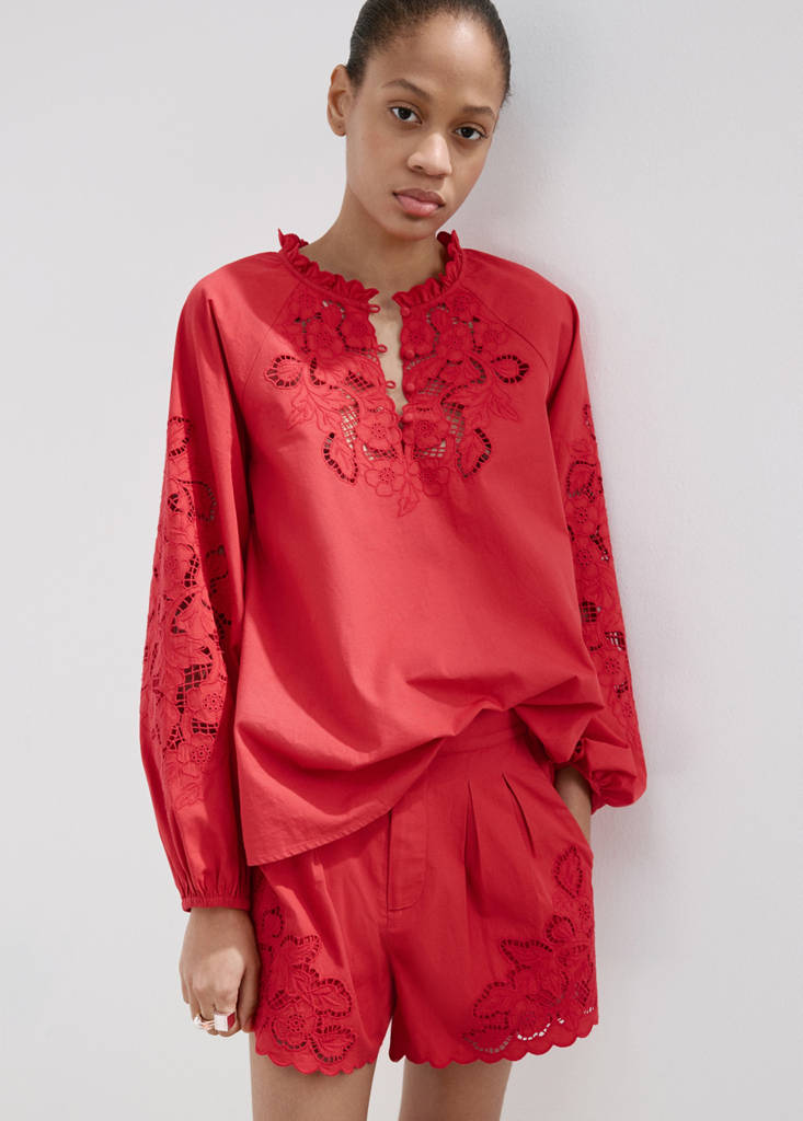 Embroidered blouse with lace accents