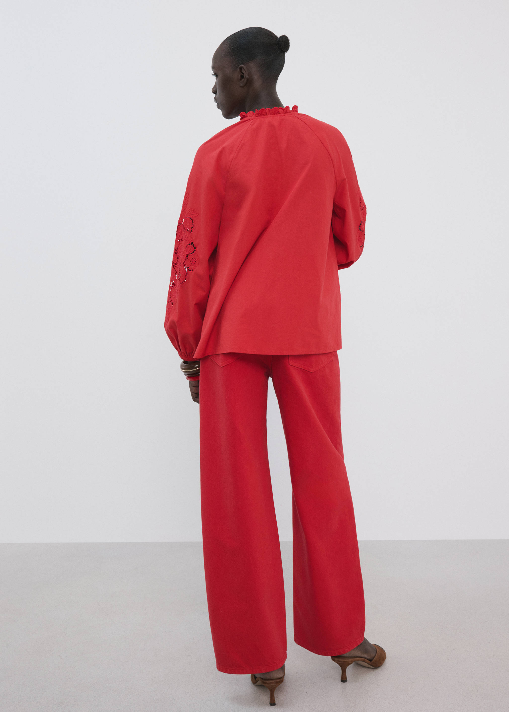 Embroidered openwork blouse - Reverse of the article