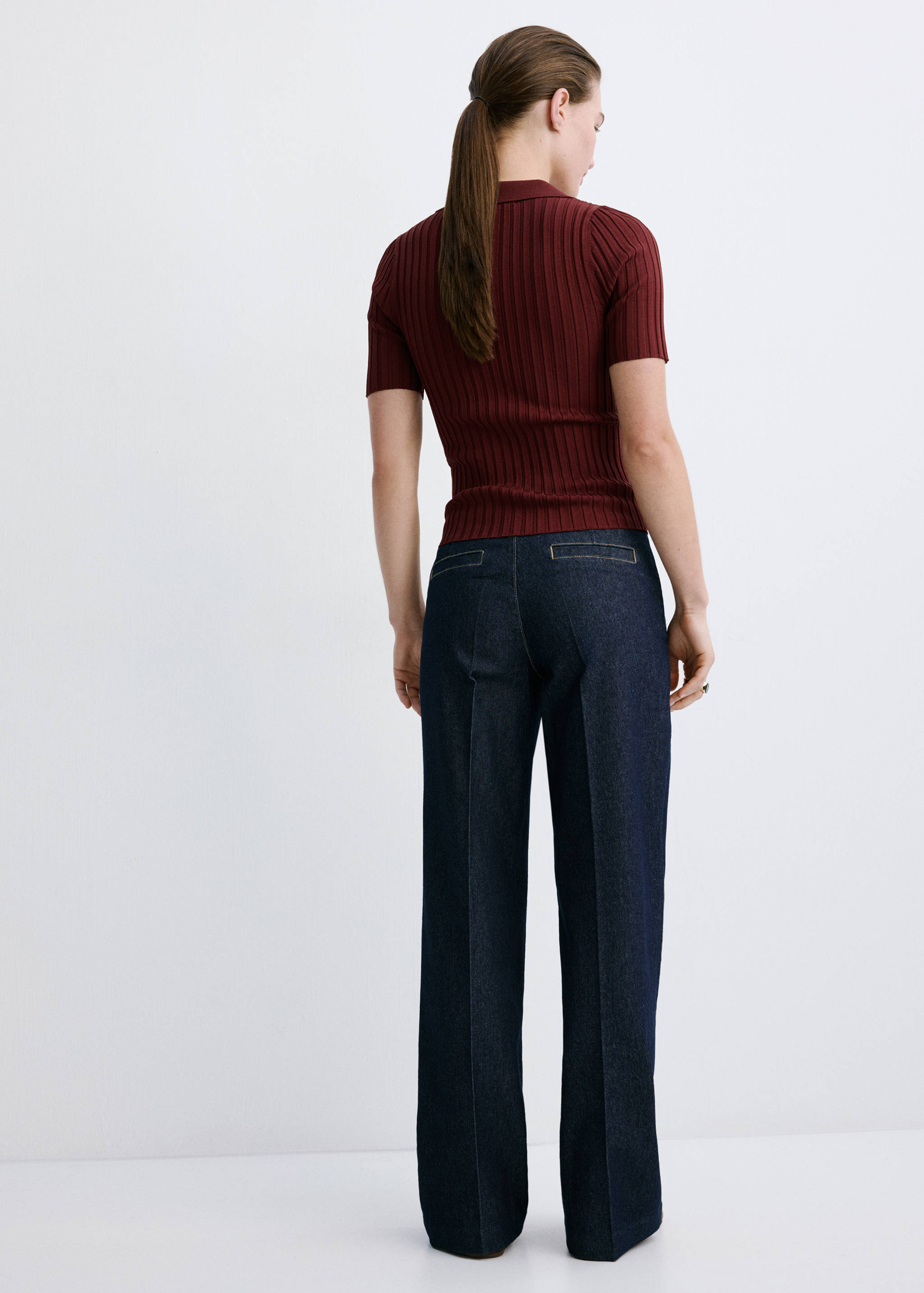Wide-leg jeans with side buttons - Reverse of the article