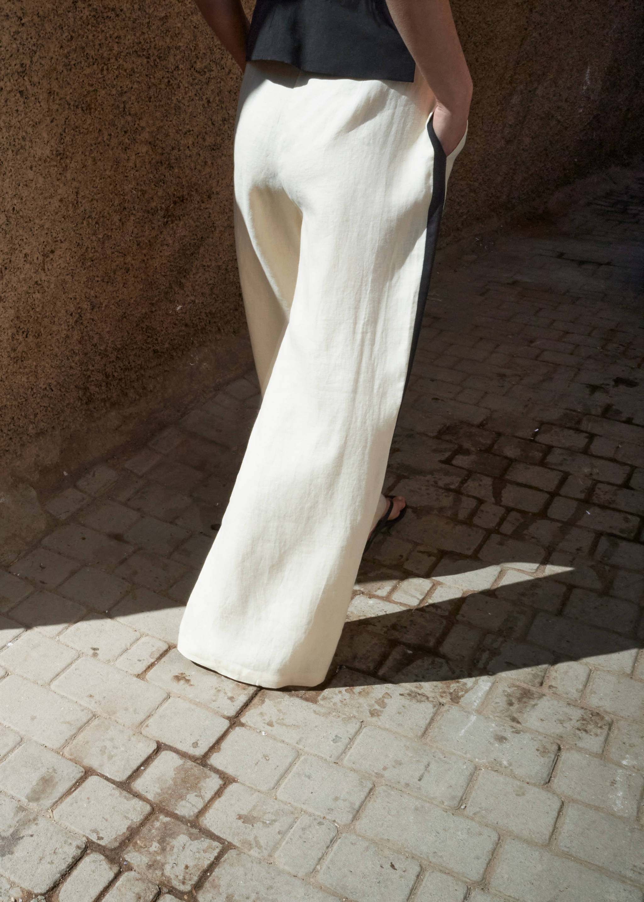 Contrast stripe linen trousers - Reverse of the article