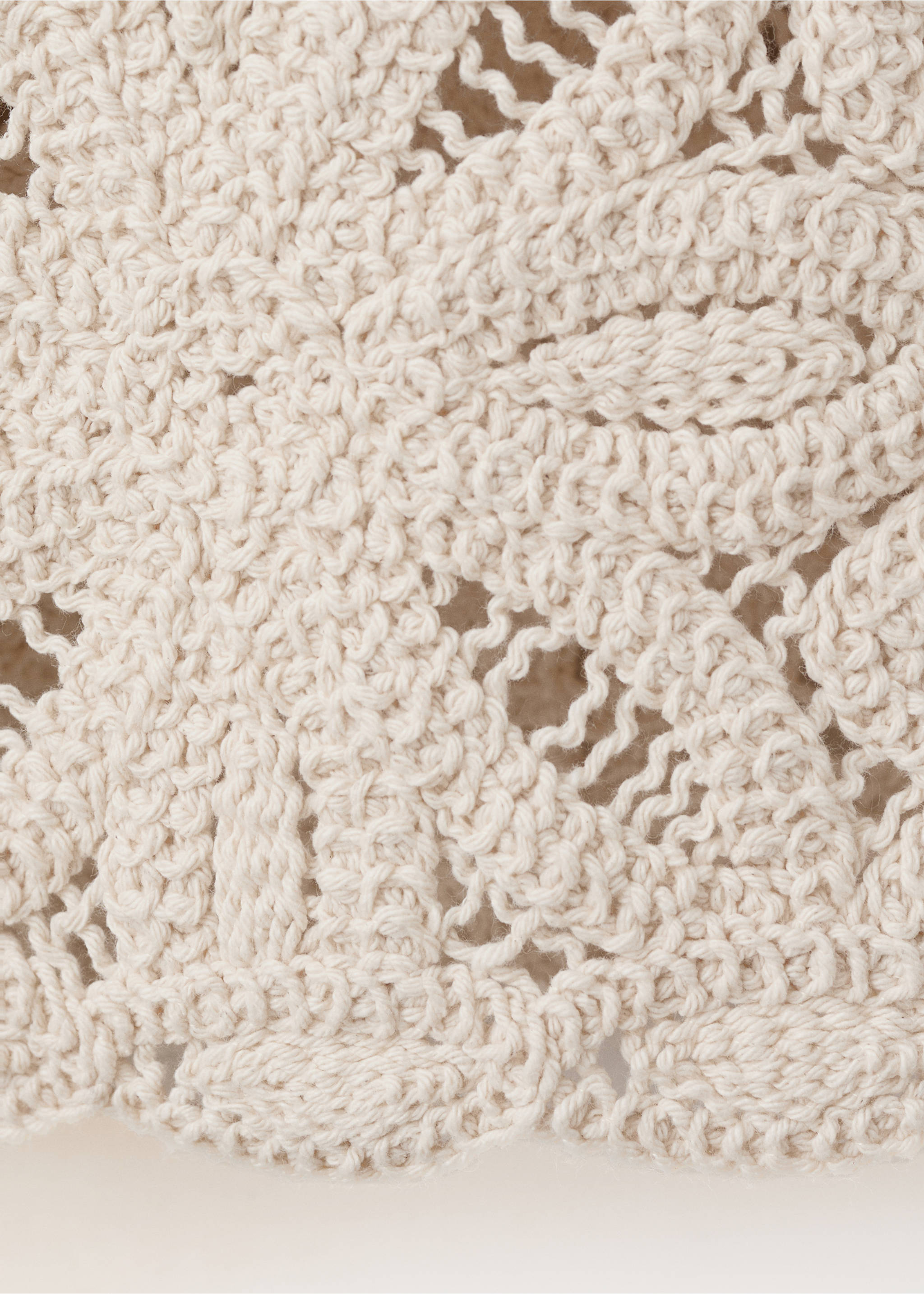 Knitted jacket with openwork details - Details of the article 8, Sand. Ref: 27049057-00.
