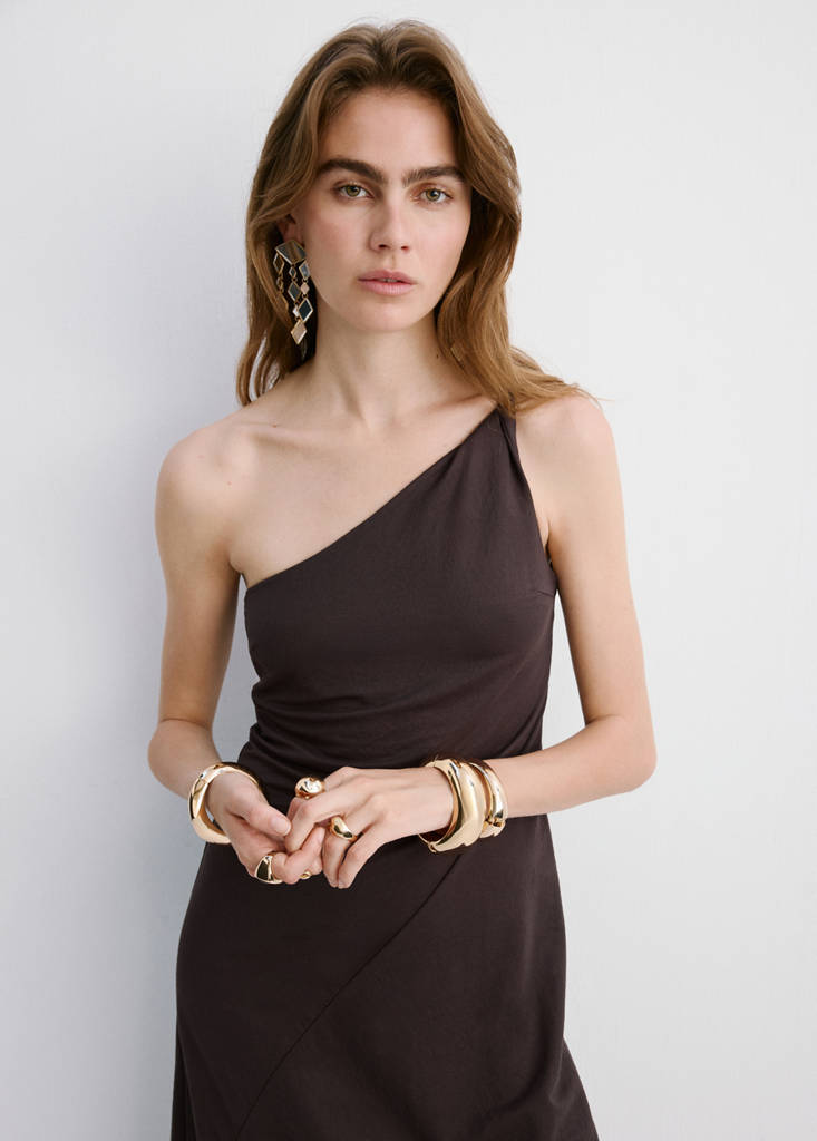Asymmetrical dress with gathered strap