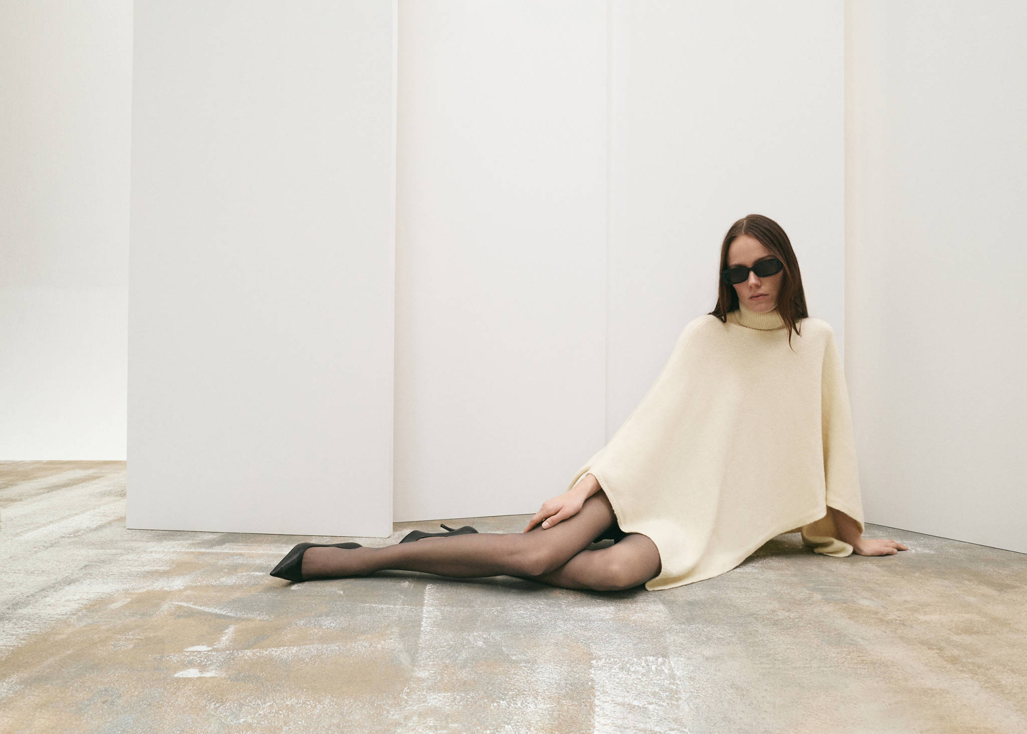 Knitted turtleneck cape - Panoramic plane