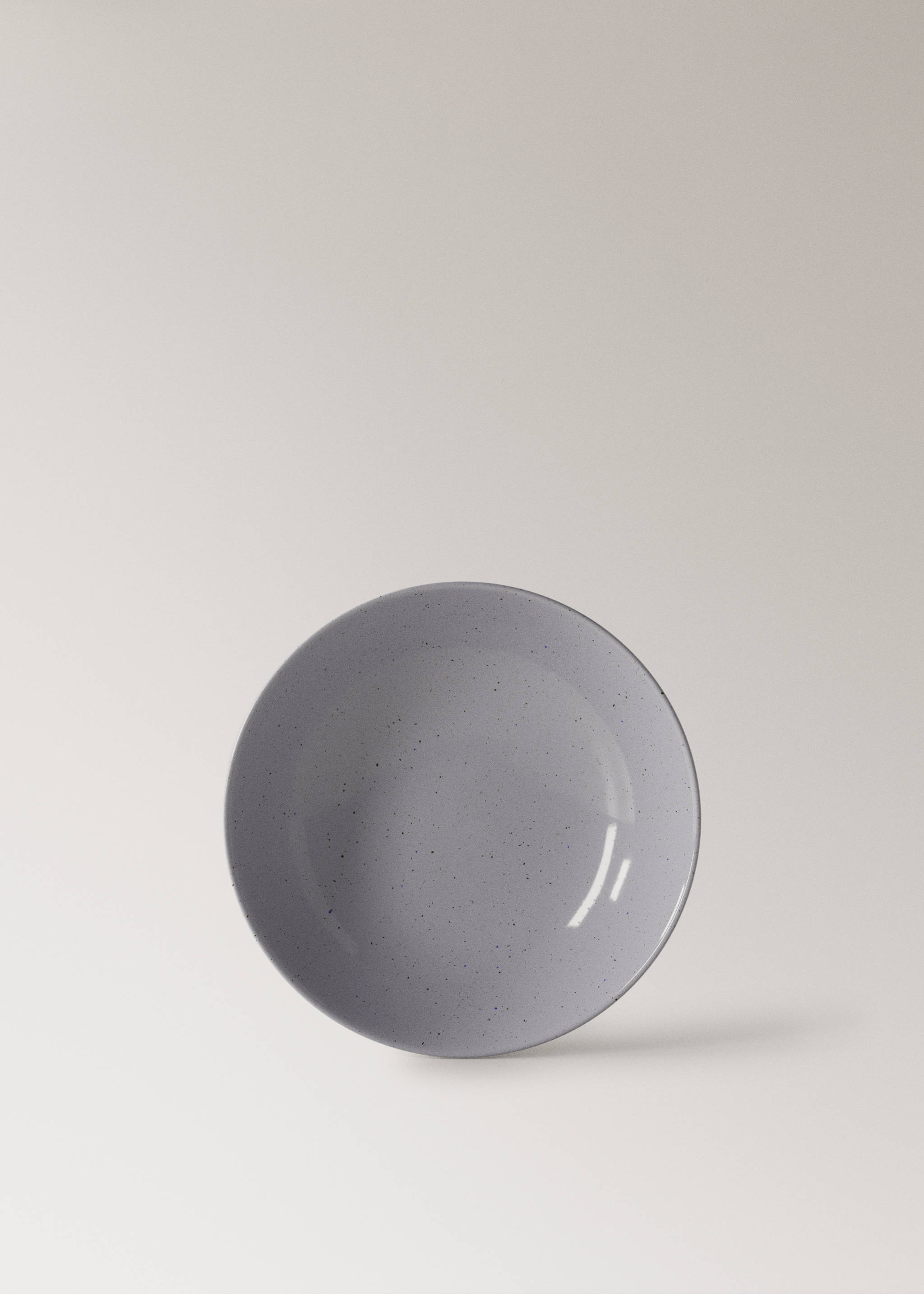 Deep stoneware plate with spots - Article without model