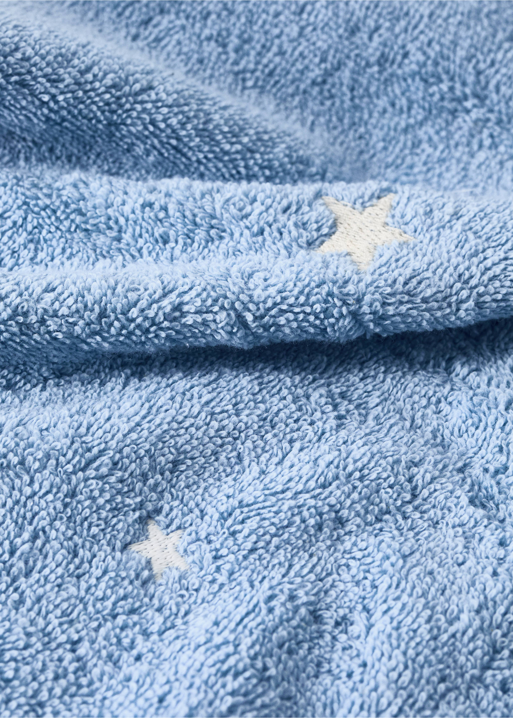 Toalla baño infantil estrellas fluorescentes - Detalle del artículo 1, Azul. Ref: 27052933-00.
