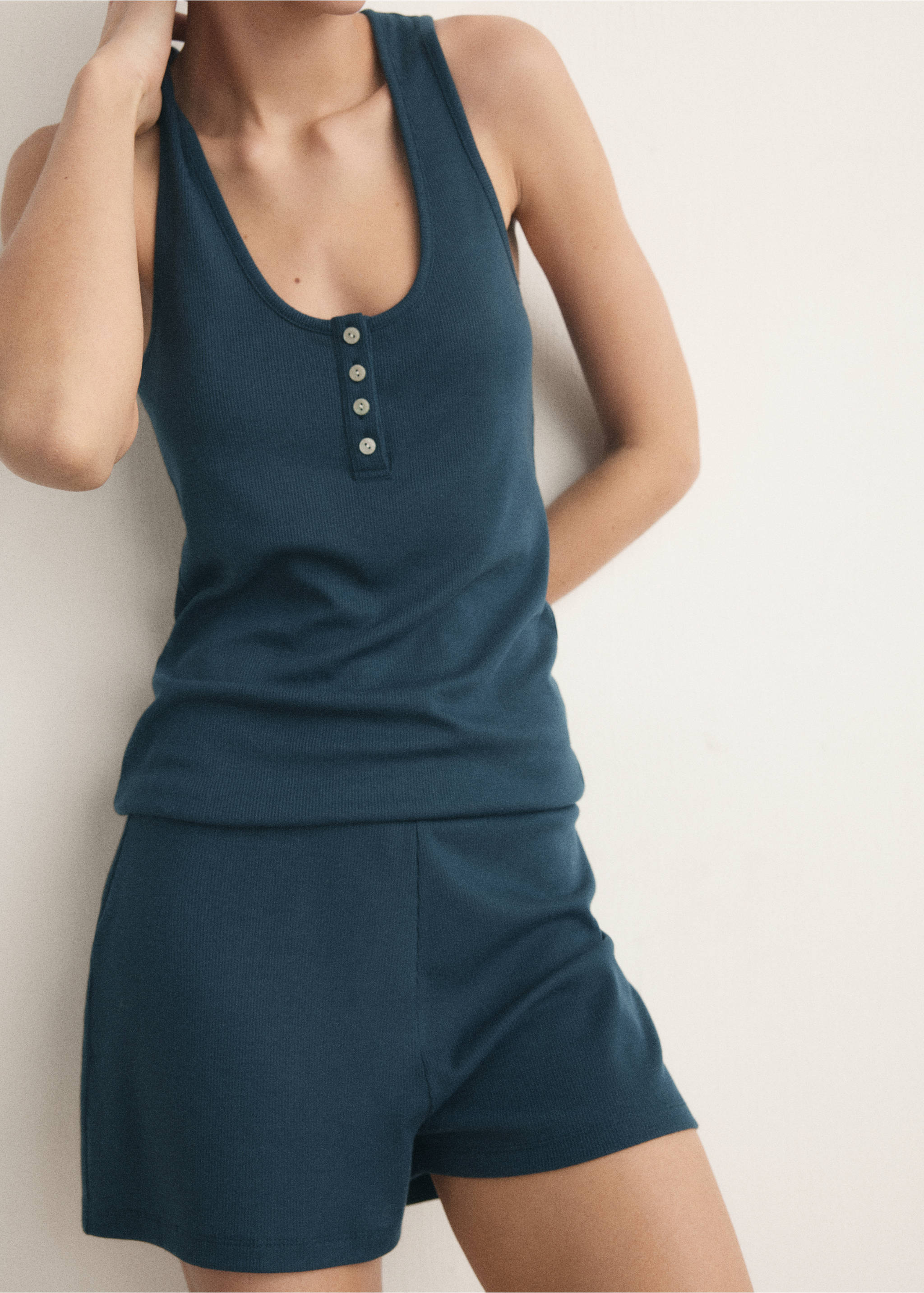 Sleeveless top with round neckline and button detail - Details of the article 6, Dark Navy. Ref: 27053326-00.