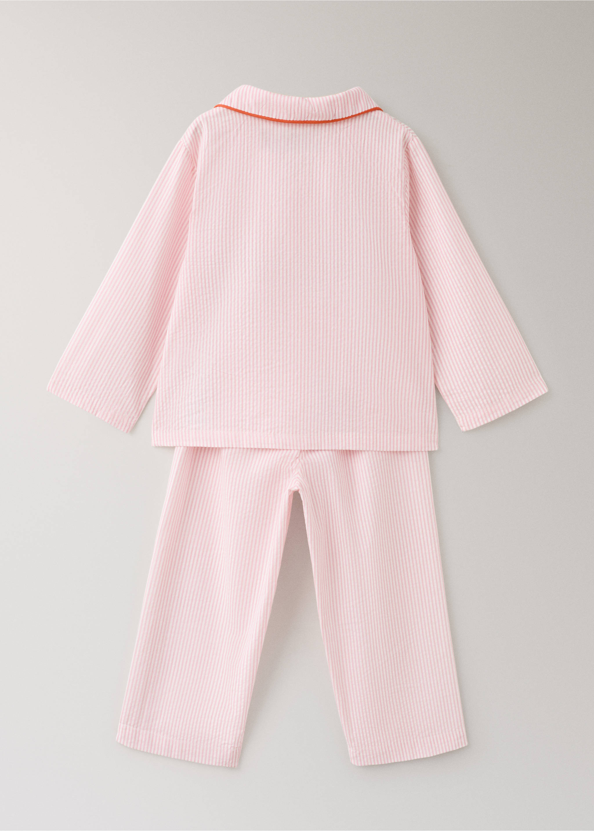 Two-piece striped seersucker cotton children’s pajamas - Details of the article 1, Pastel Pink. Ref: 27053739-00.