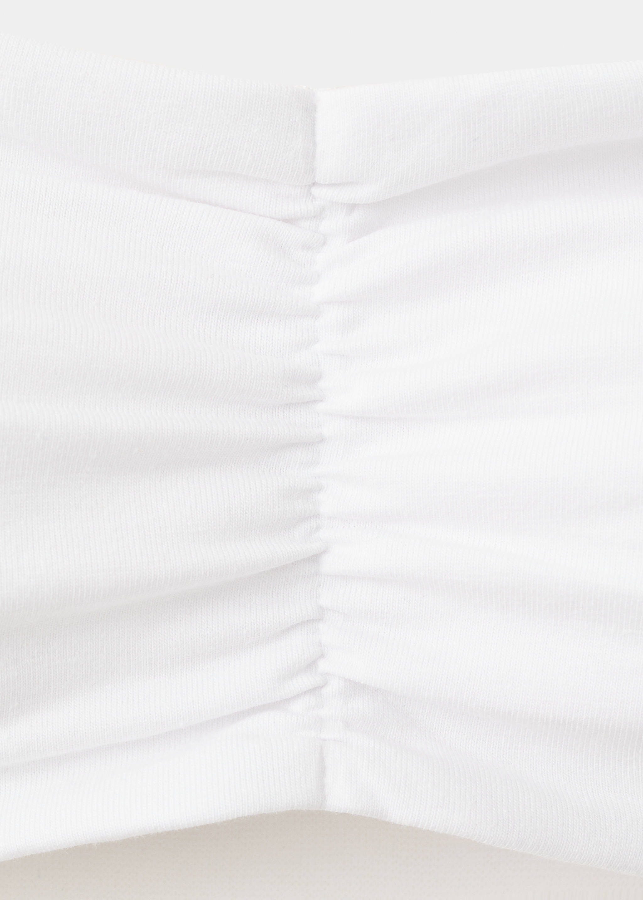 Top bandó - Detall de l'article 8