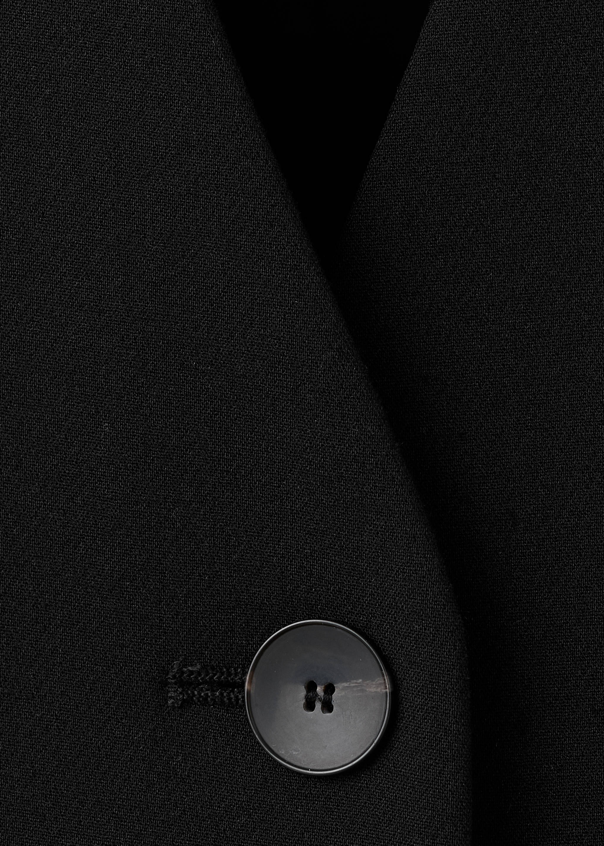 Getailleerd gilet - Detail van het artikel 8