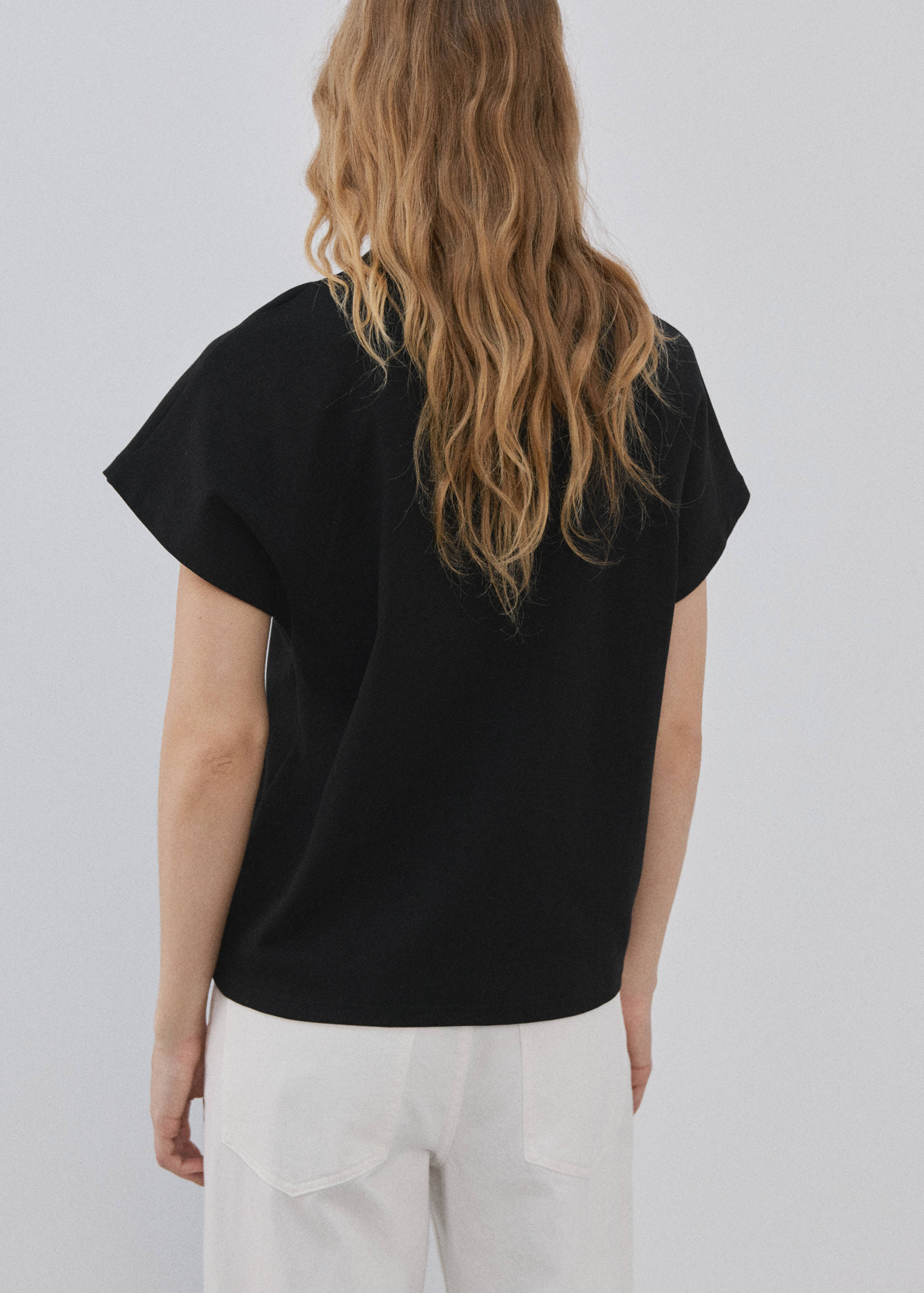 Short-sleeved cotton t-shirt - Reverse of the article