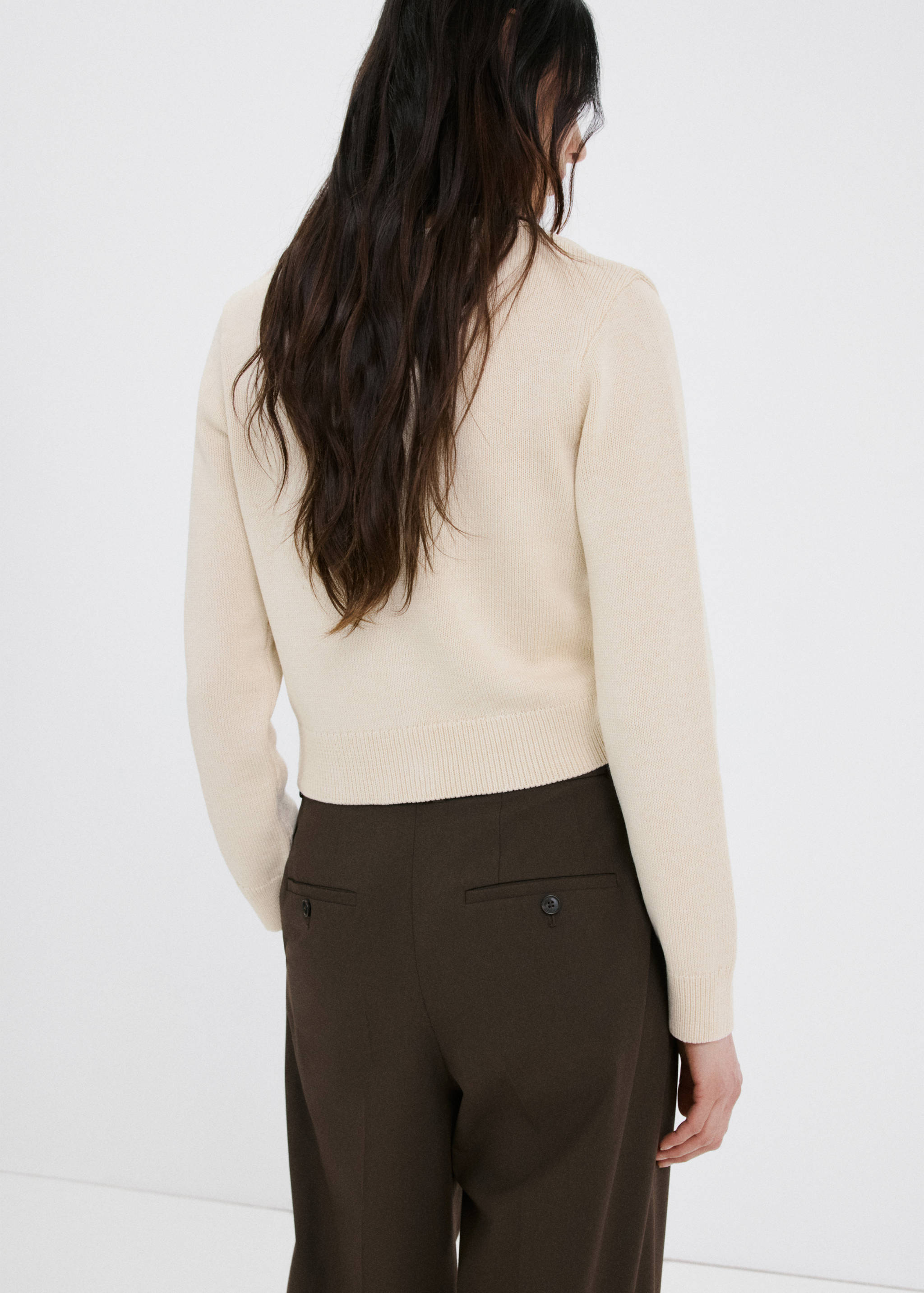 Knitted cardigan with ties - Reverse of the article