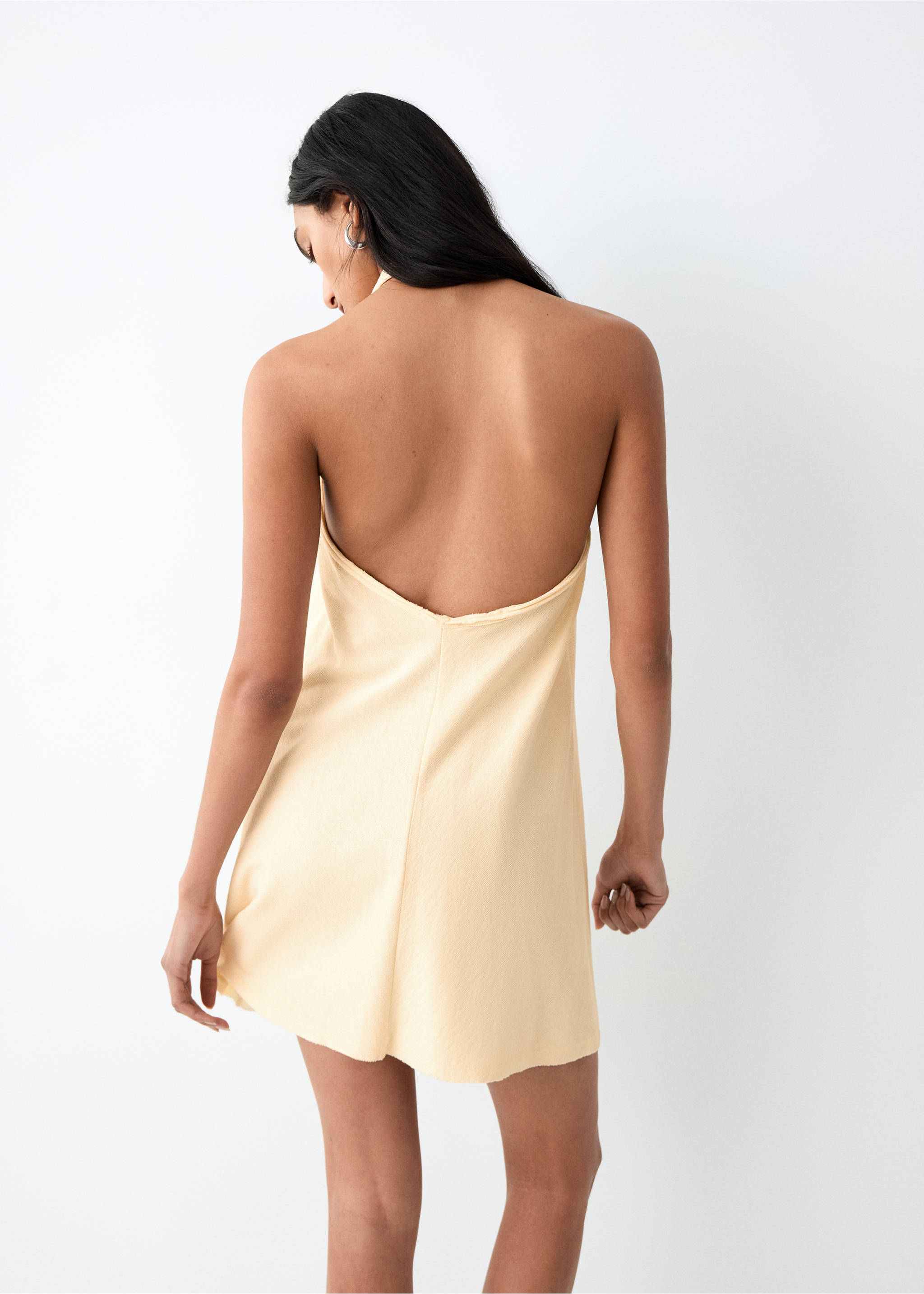 Short halter-neck dress - Reverse of the article, Pastel Yellow. Ref: 27055962-00.