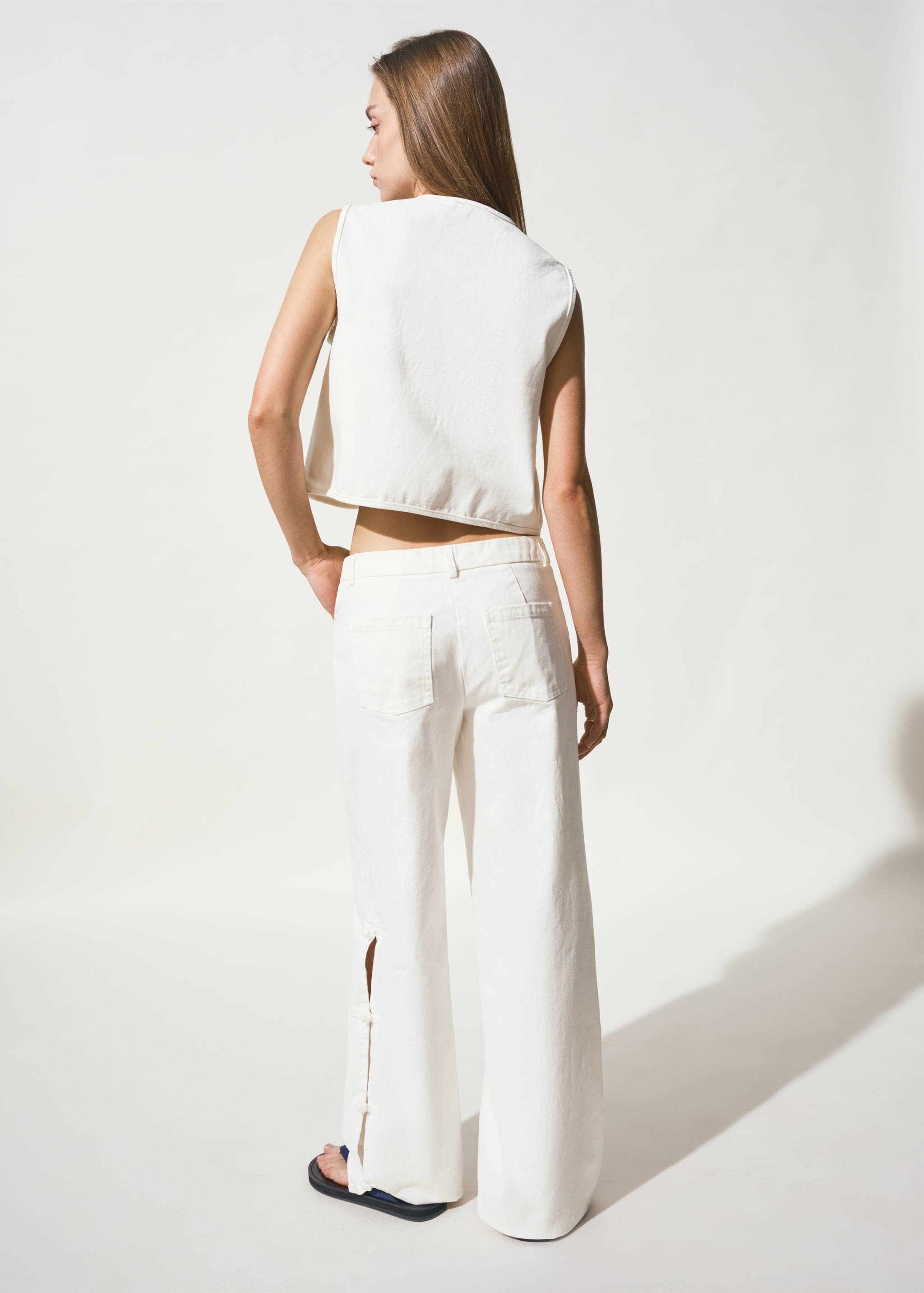 Straight-leg jeans with side details - Reverse of the article