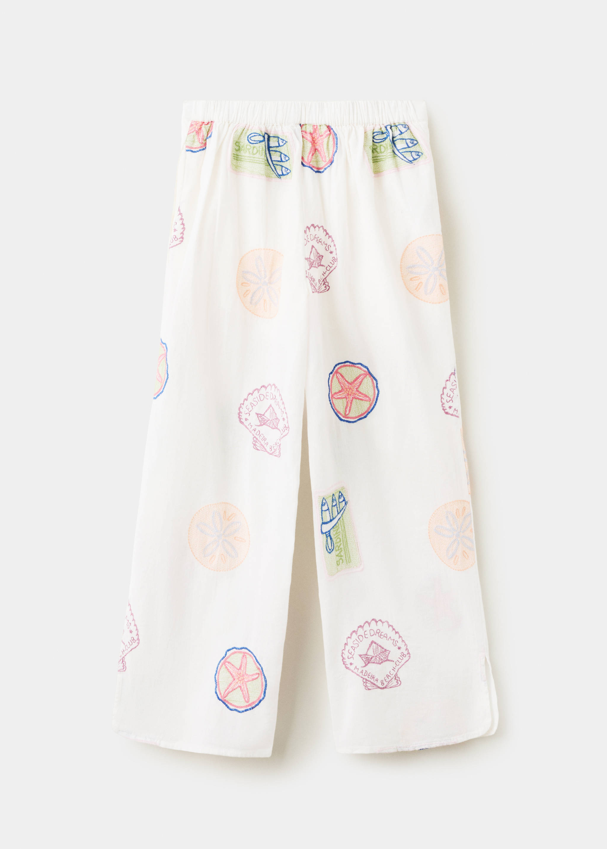 Long trousers with embroidered details - Reverse of the article