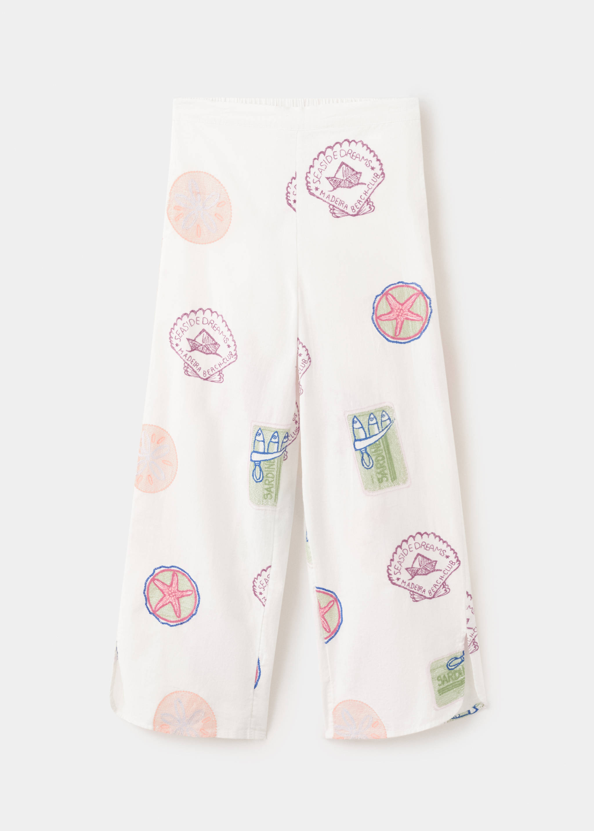 Long trousers with embroidered details - Article without model