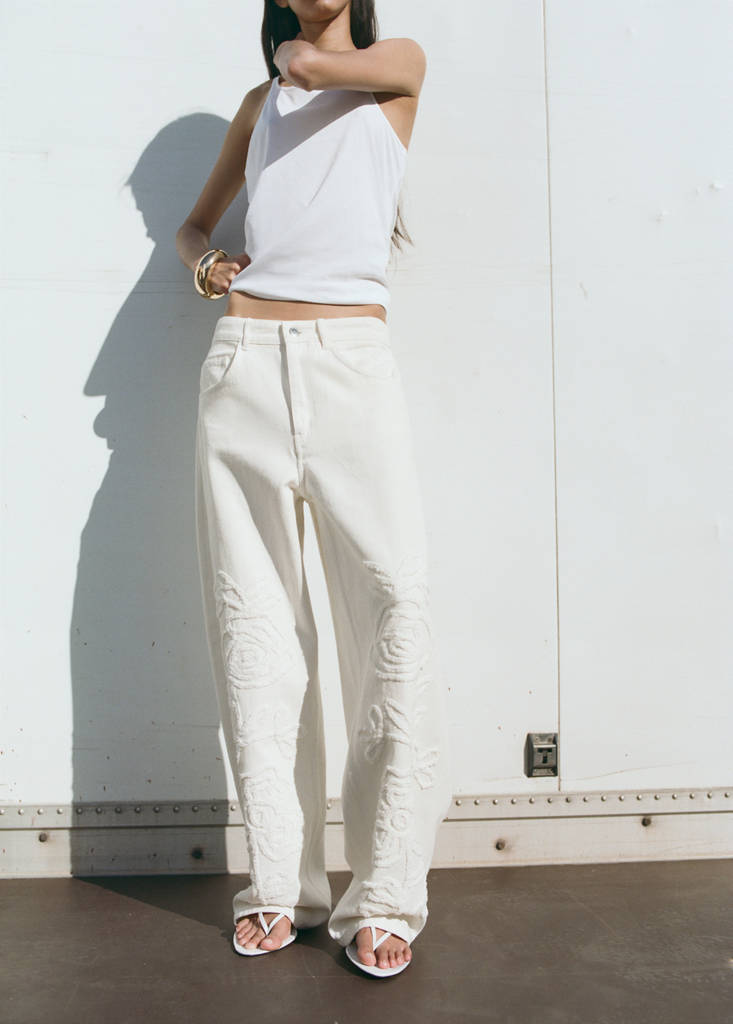 Wide leg jeans with floral embroidery — Off White