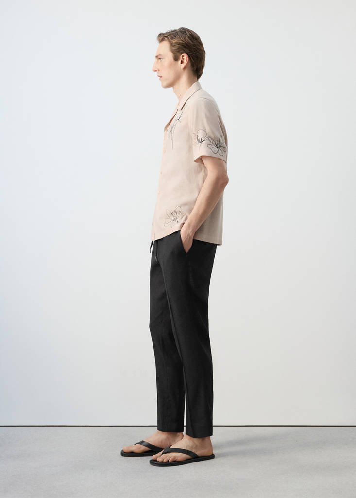 Striped slim-fit linen trousers — Black