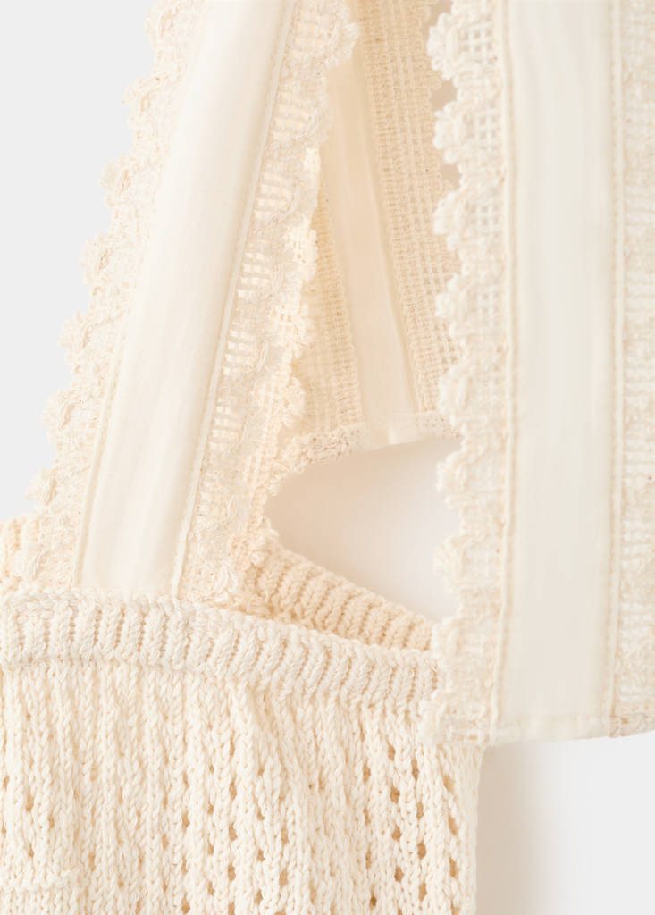 Openwork knitted top with bows — Ecru