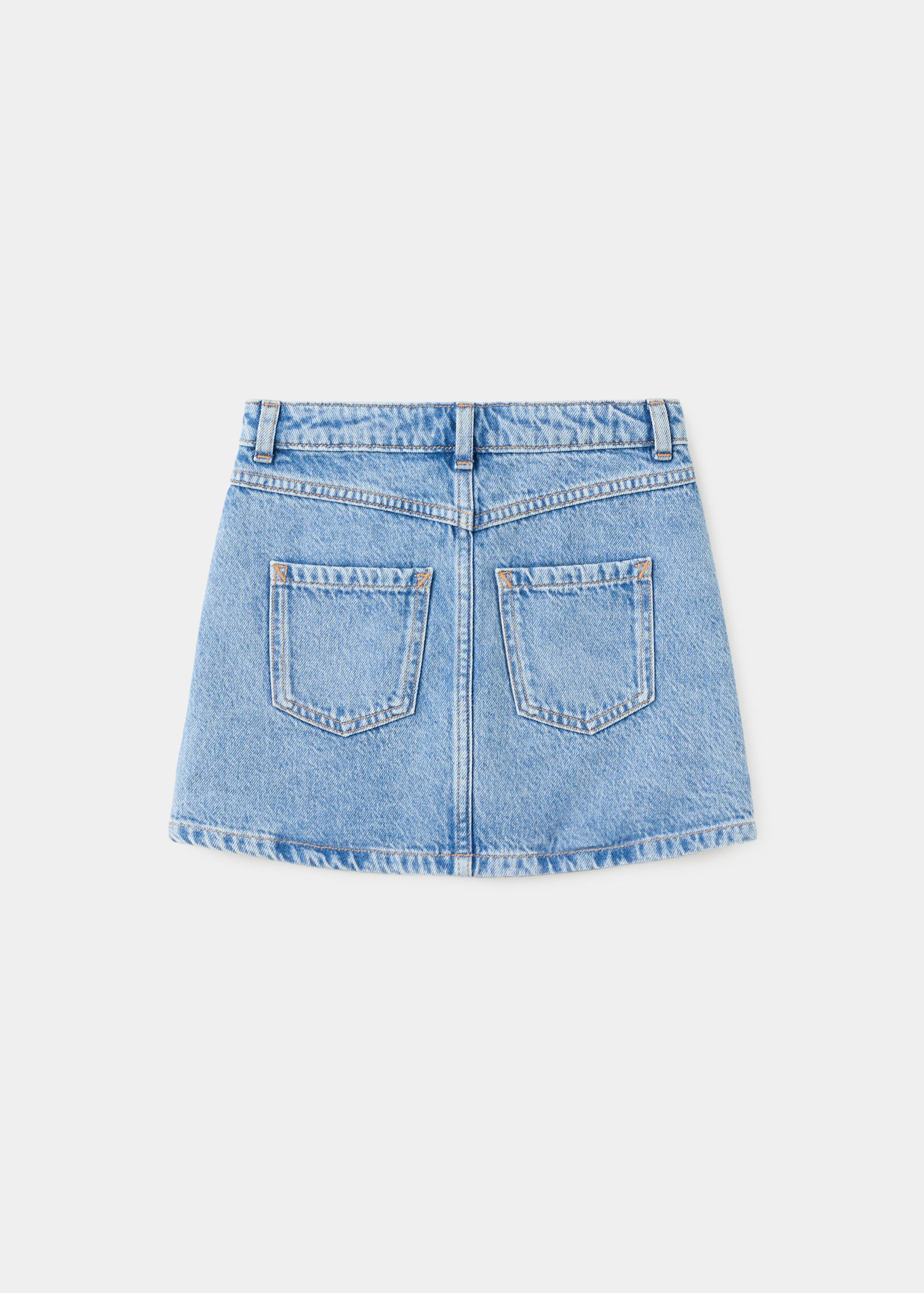 Джинсовая юбка с декоративными заклепками - Обратная сторона изделия