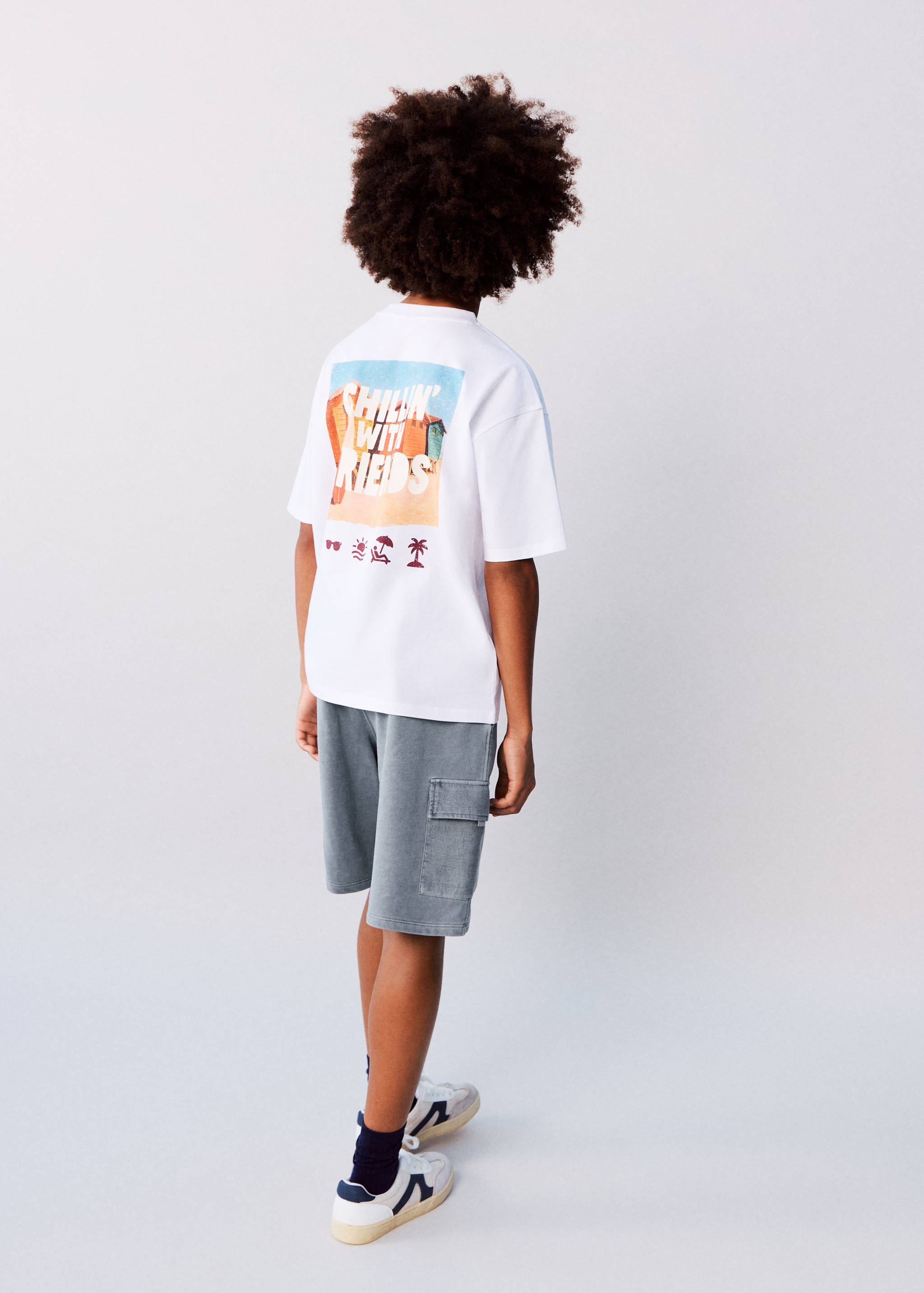 Cargo pockets Bermuda shorts - Details of the article 1