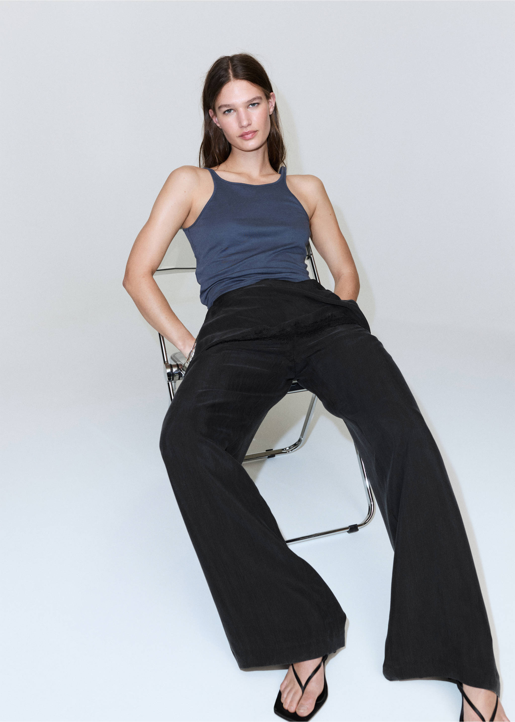 High-waisted lyocell trousers - Details of the article 3, Black. Ref: 27058665-00.