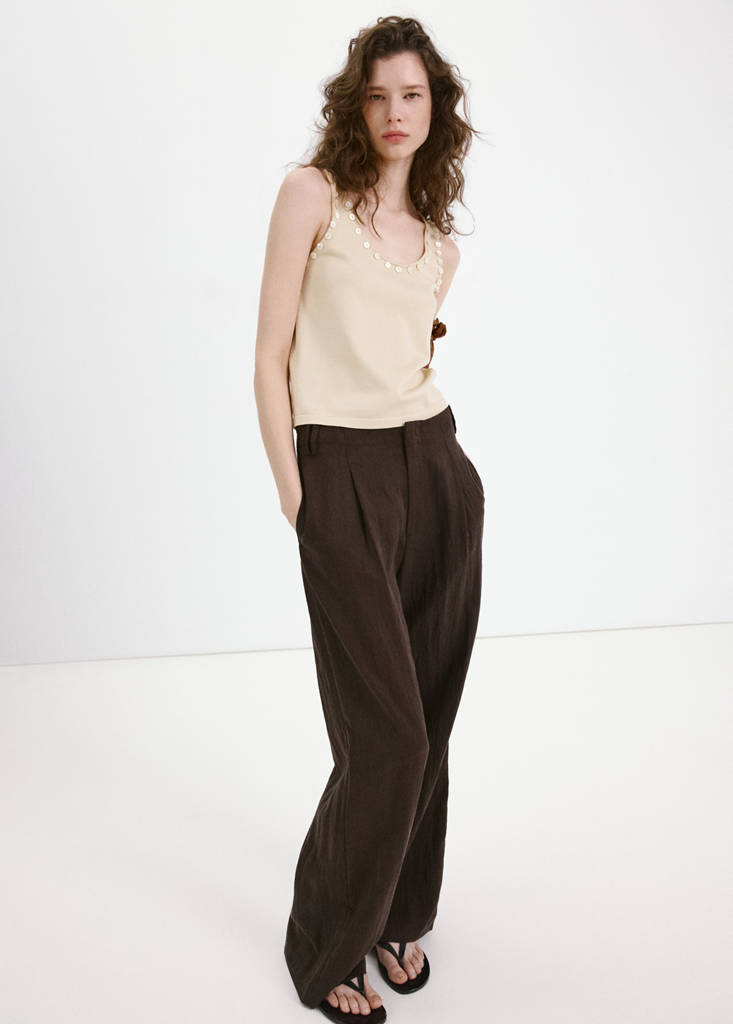 Sleeveless top with decorative buttons — Ecru