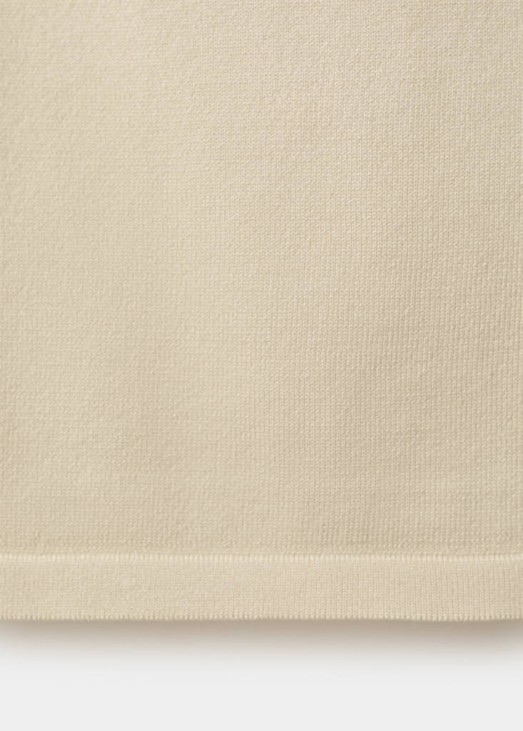 Sleeveless top with decorative buttons — Ecru