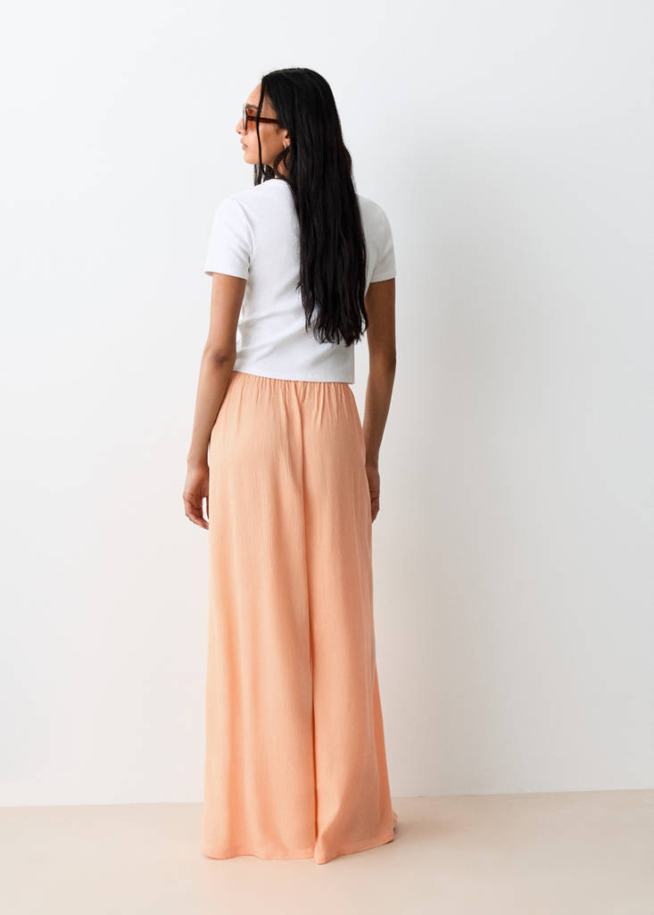 Fluid trousers with side openings — Peach