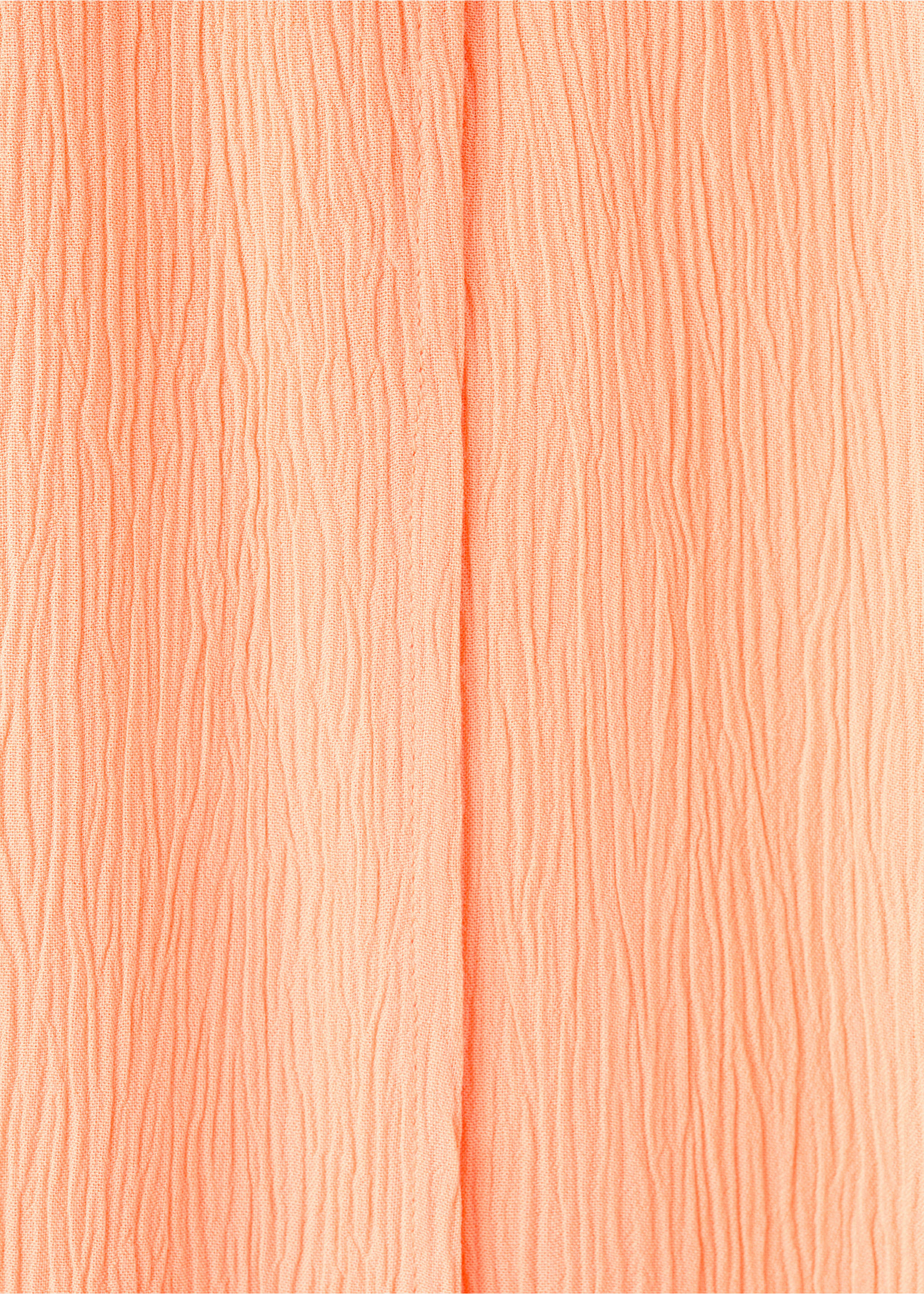 Fluid trousers with side openings - Details of the article 8, Peach. Ref: 27059212-00.