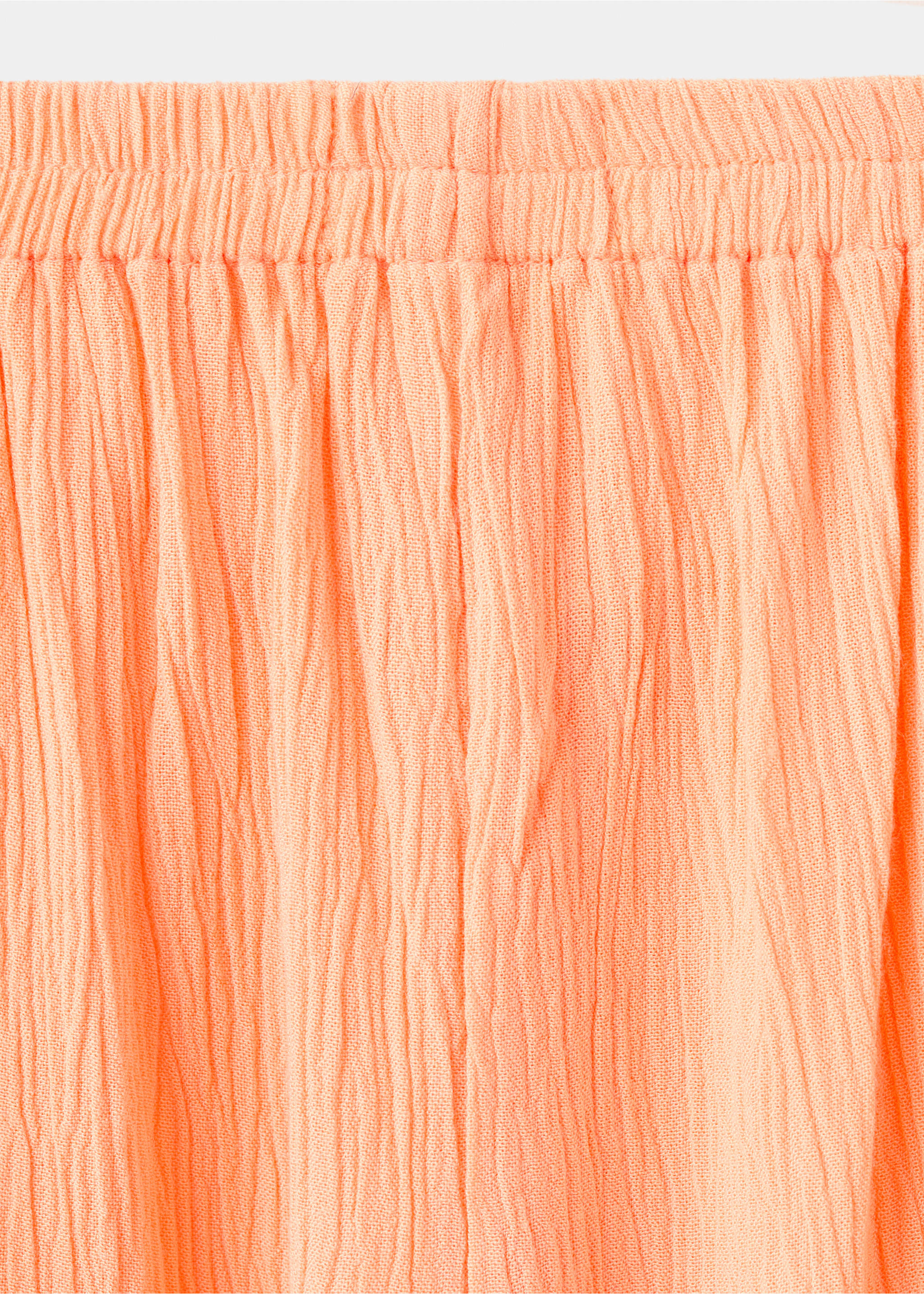 Fluid trousers with side openings - Details of the article 0, Peach. Ref: 27059212-00.