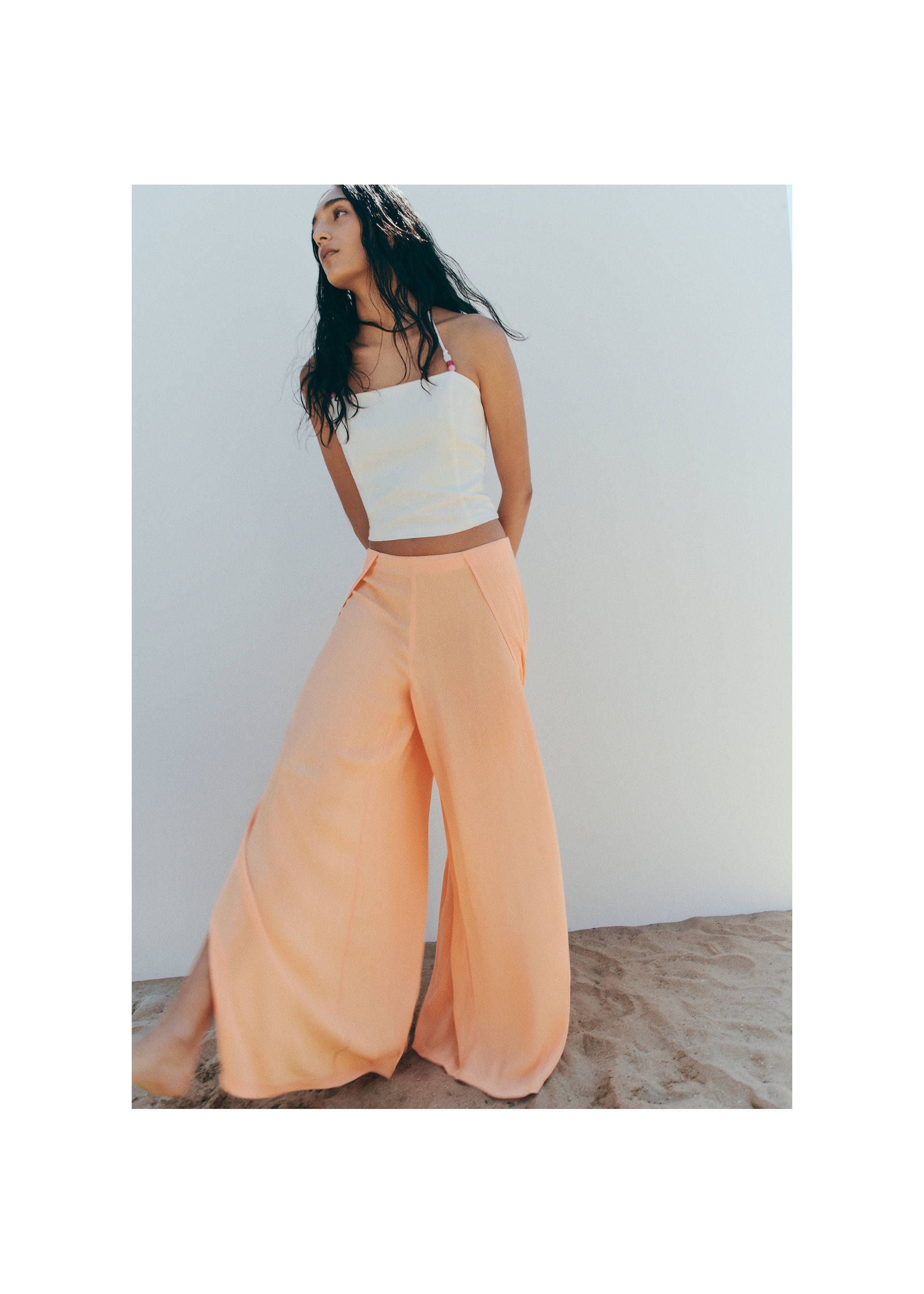 Pantalón fluido aberturas laterales - Detalle del artículo 5, Melocotón. Ref: 27059212-00.