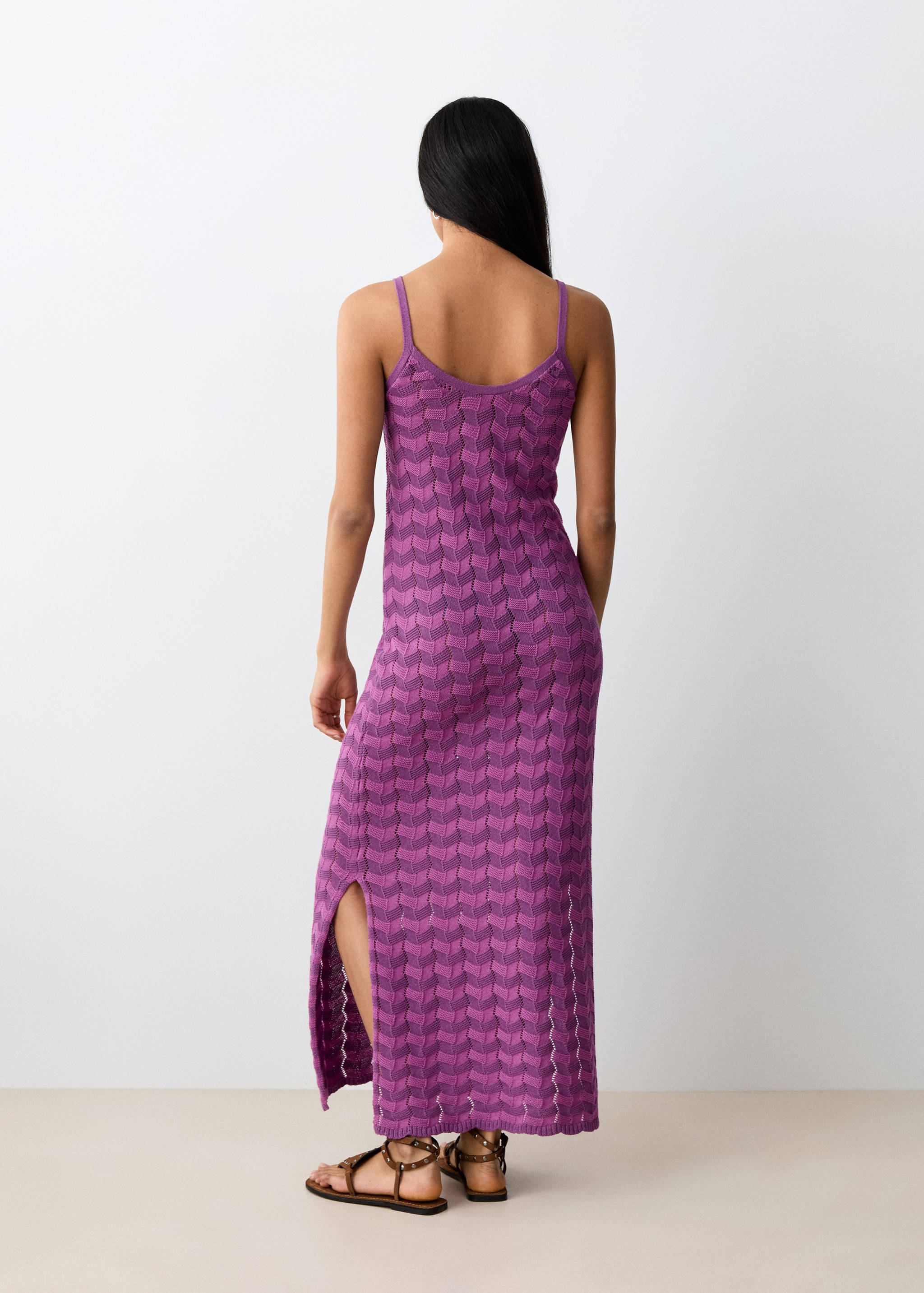Open-knit dress with side opening - Reverse of the article