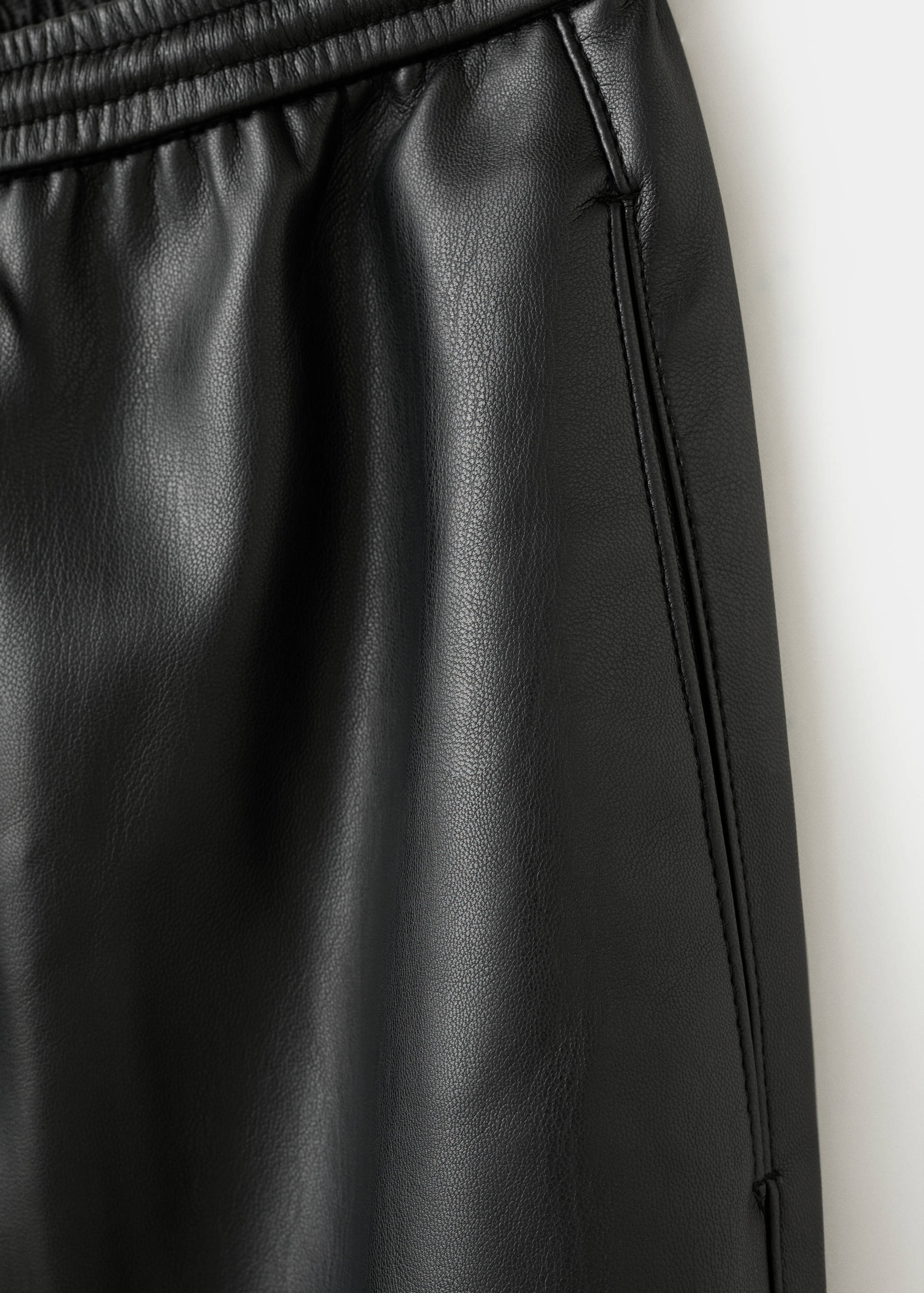 Faux-leather trousers with elastic waist - Details of the article 8