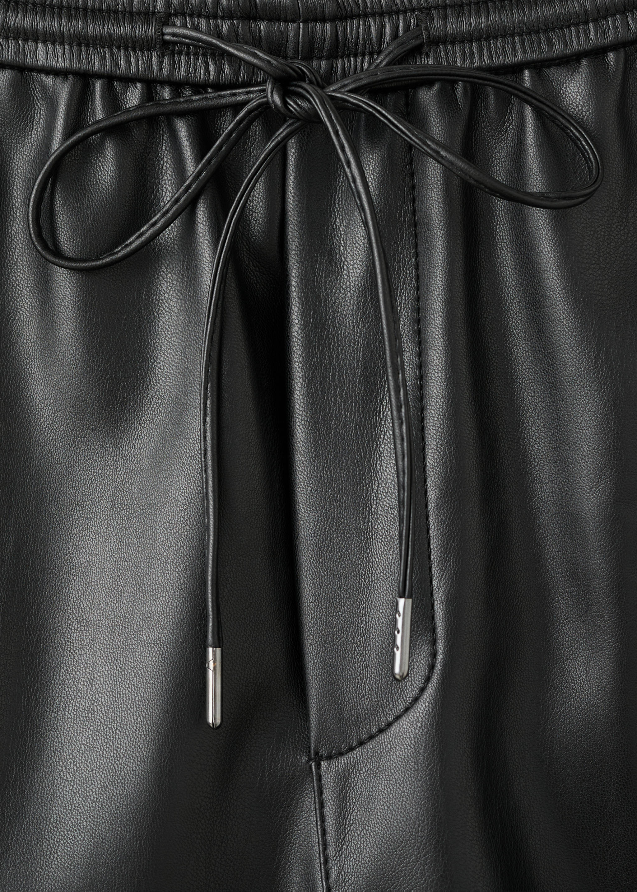 Faux-leather trousers with elastic waist - Details of the article 0, Black. Ref: 27061293-00.