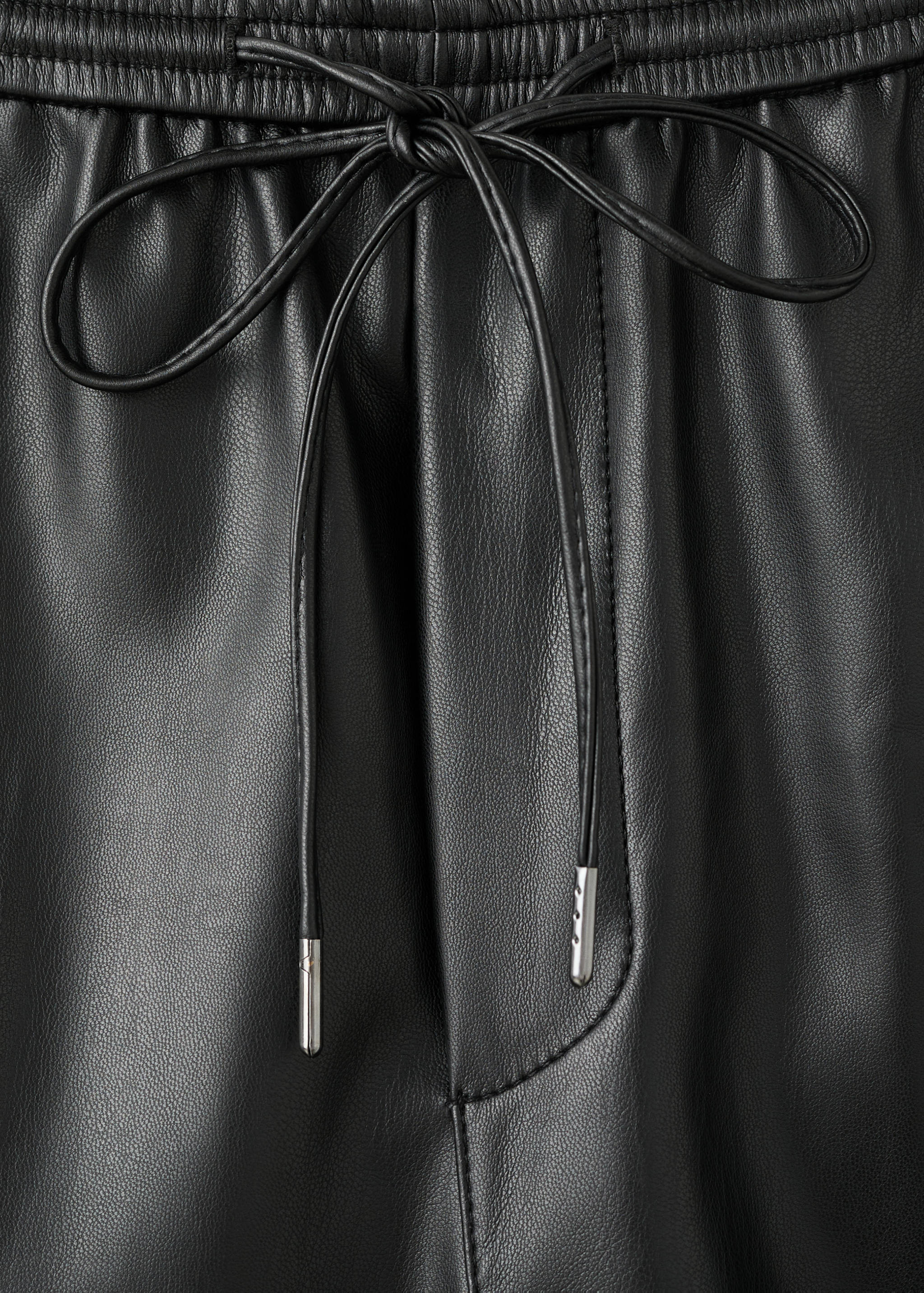 Faux-leather trousers with elastic waist - Details of the article 0