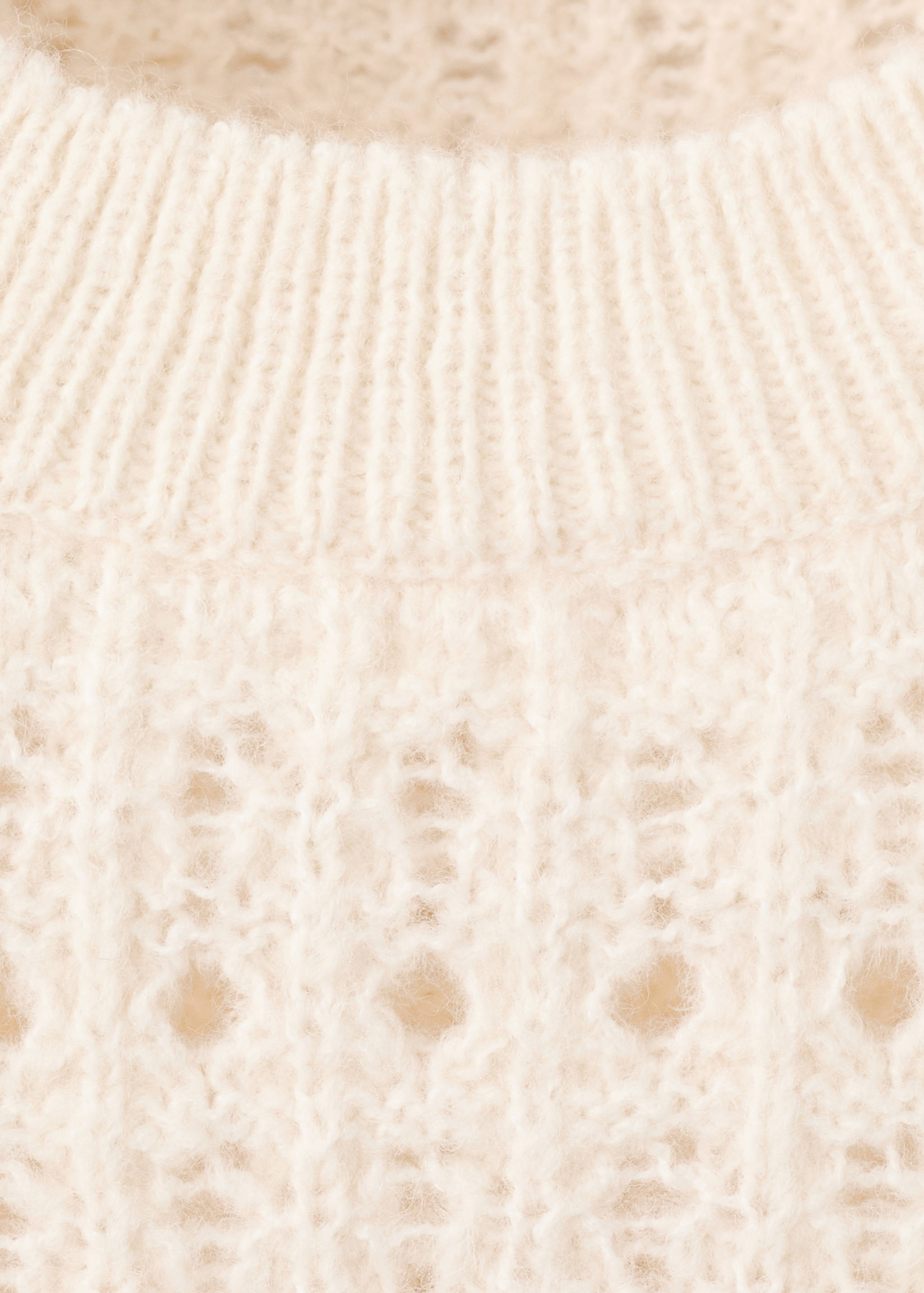 Openwork knitted sweater with ruffles - Details of the article 0