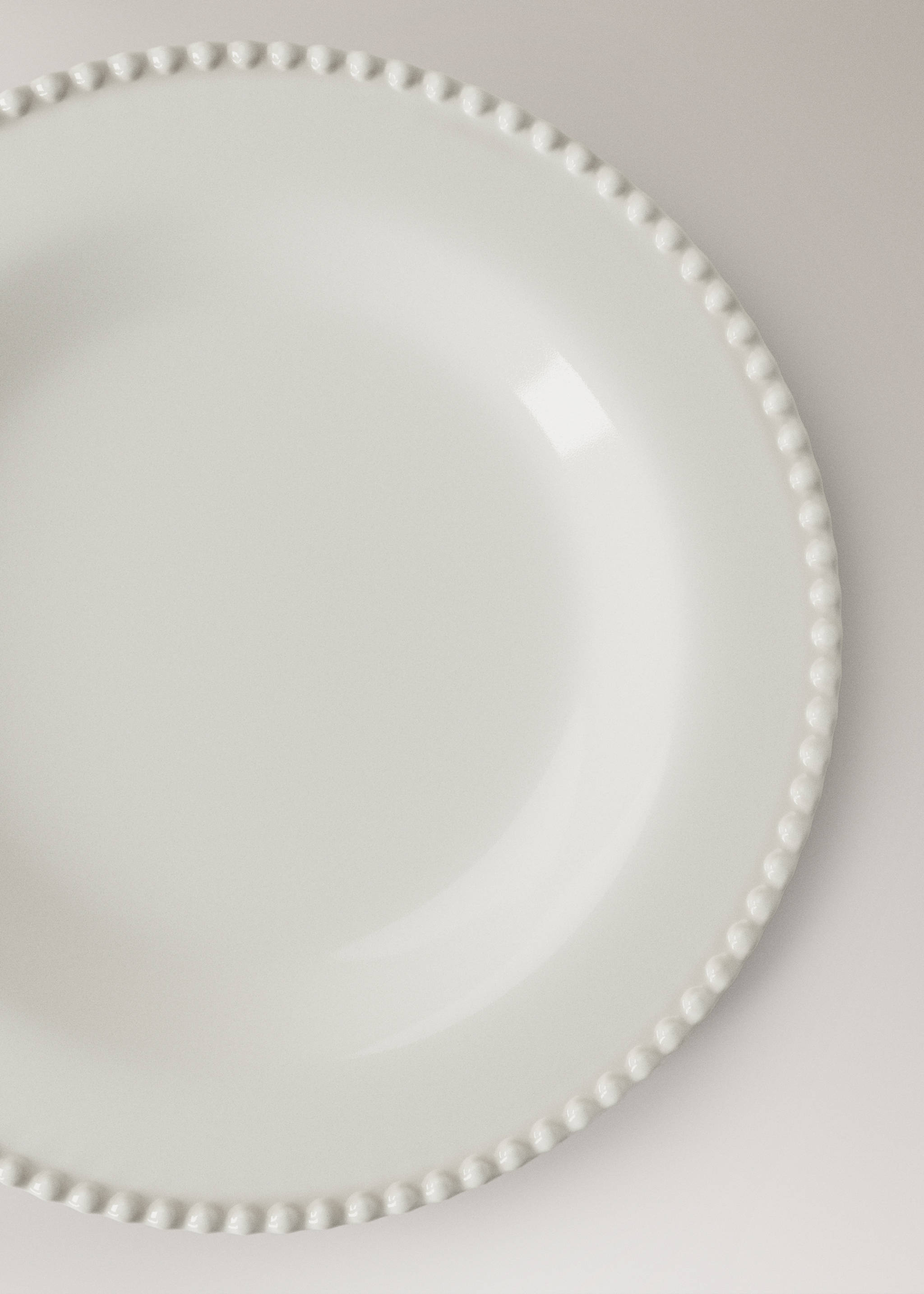 Essteller aus Steingut mit verziertem Rand - Detail des Artikels 1