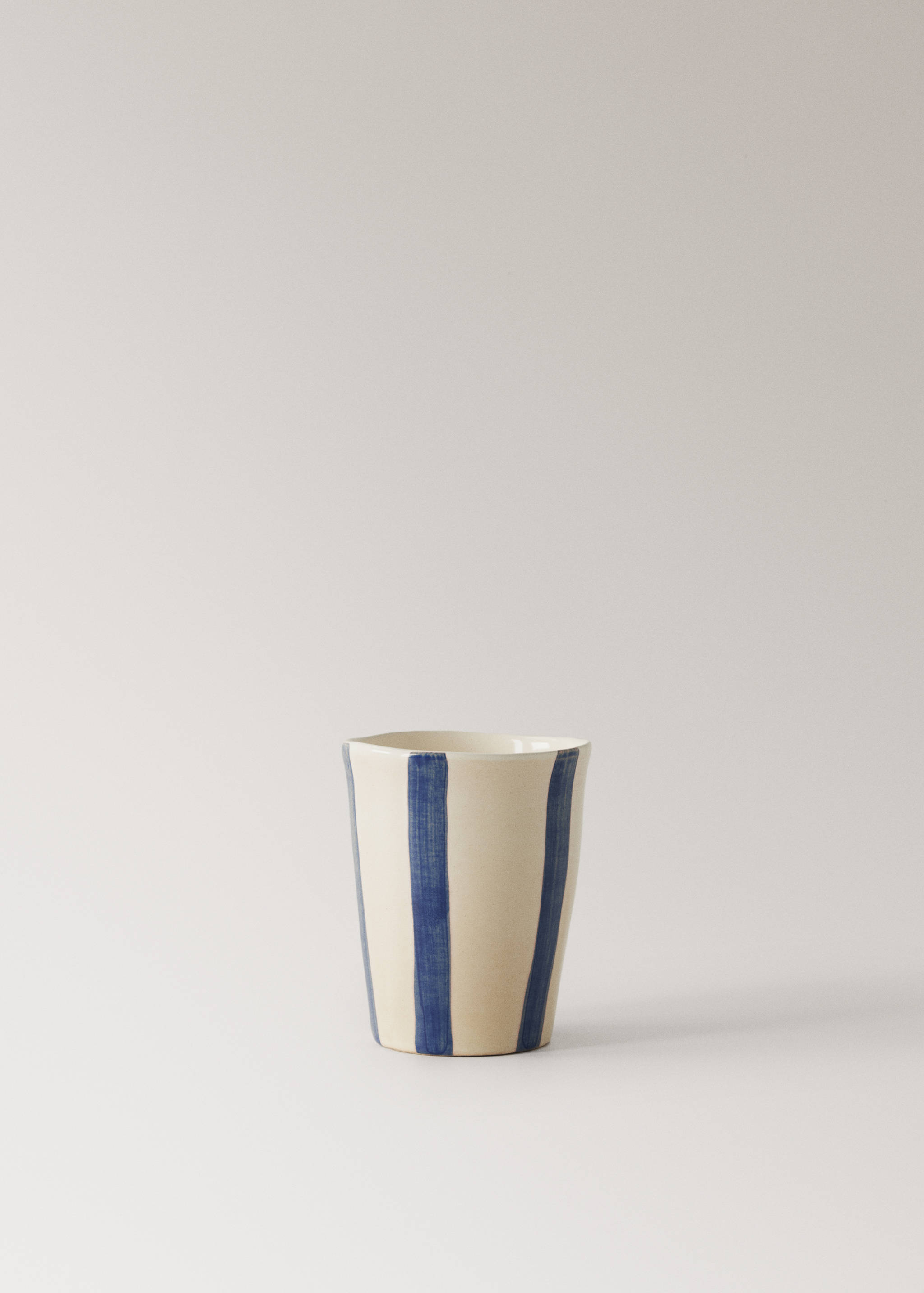 Striped stoneware coffee cup - Article without model