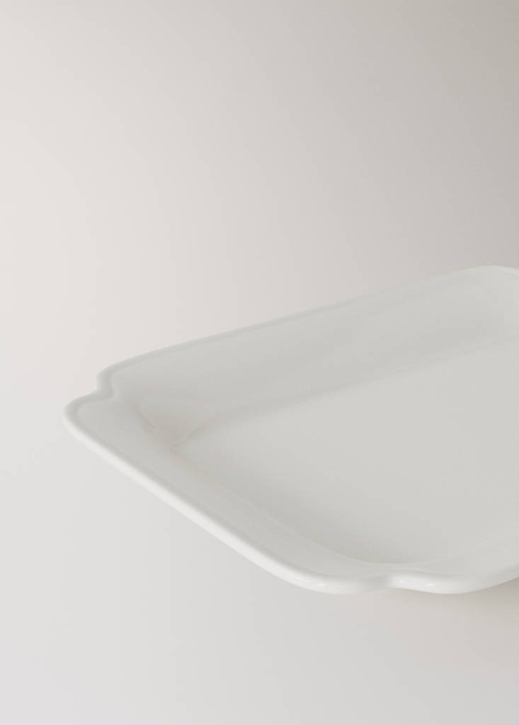 Small embossed earthenware dish — White