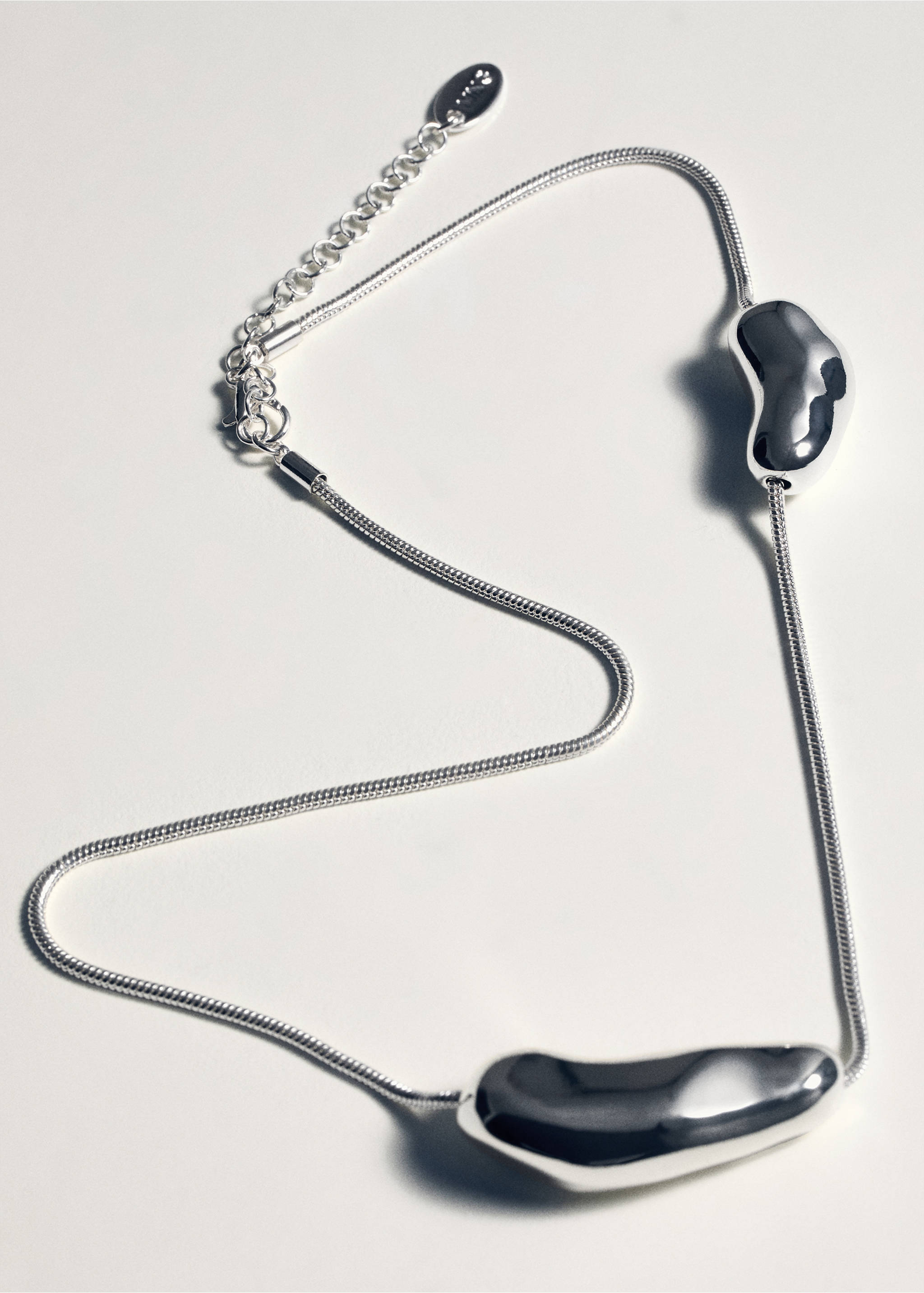 Necklace with irregular metallic pieces - Details of the article 5, Silver. Ref: 27062927-00.