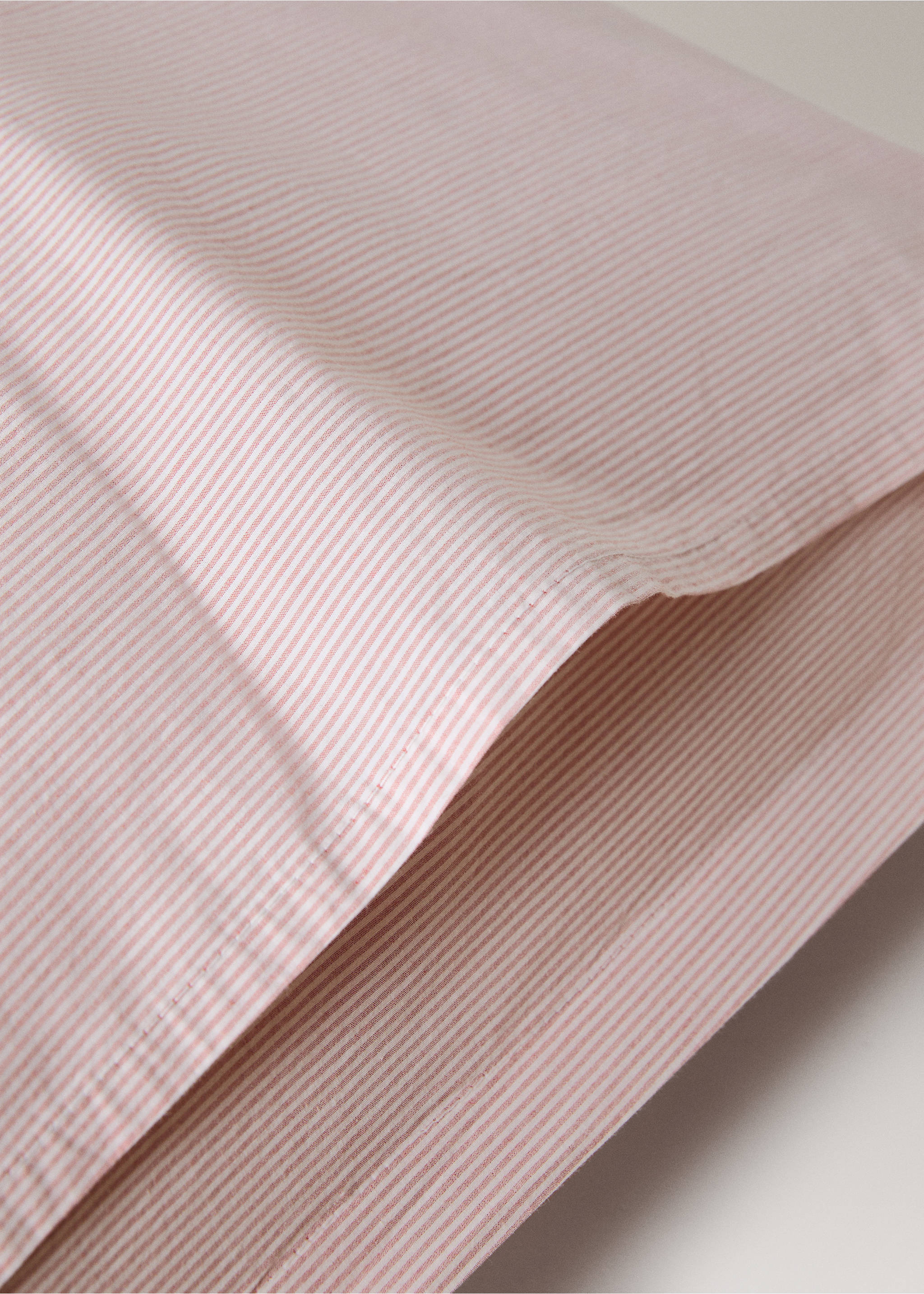 Two yarn-dyed cotton pillowcases 50x75 cm - Details of the article 1, Grapefruit. Ref: 27063278-00.