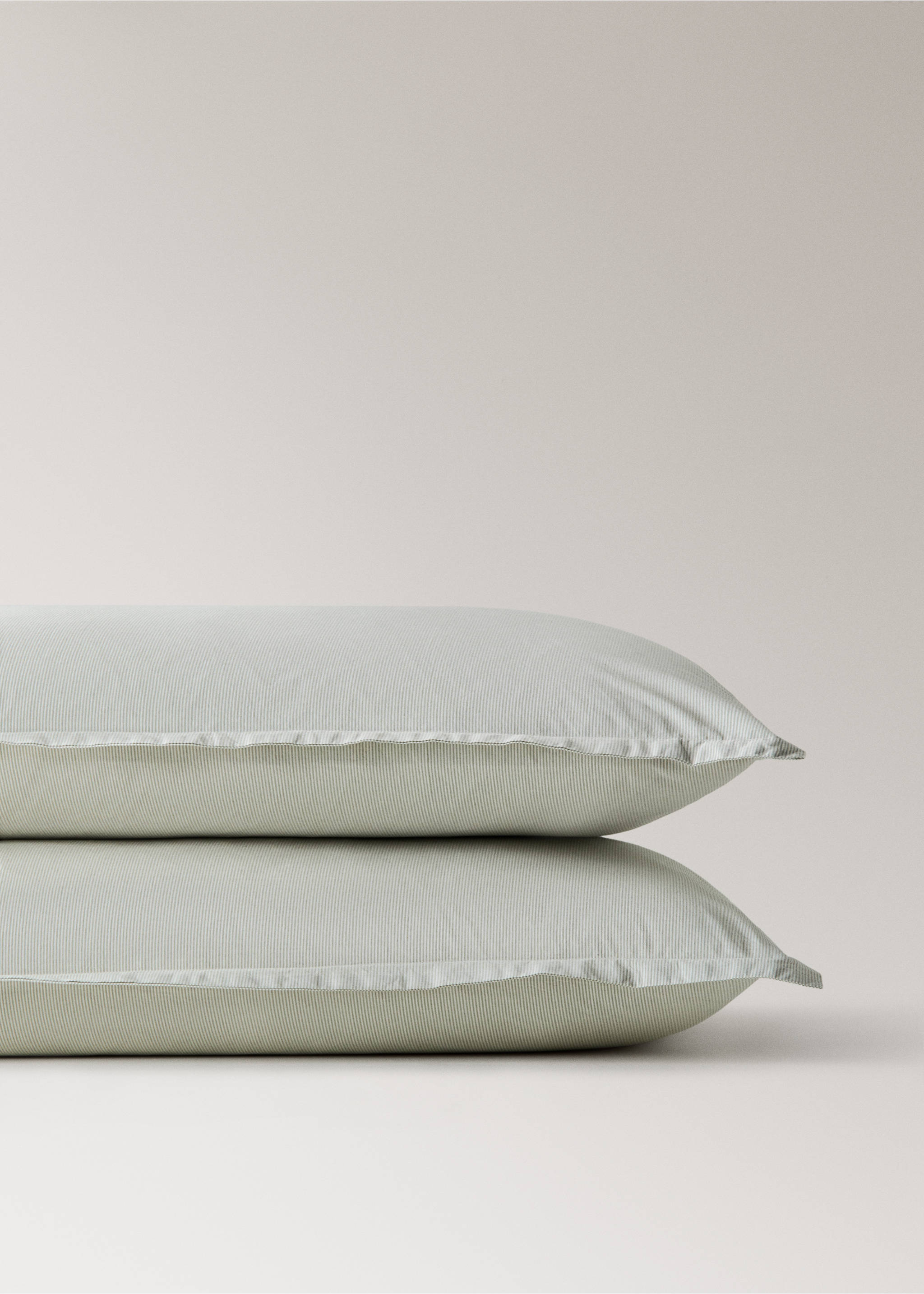 Two yarn-dyed cotton pillowcases 50x75 cm - Details of the article 3, Pastel Green. Ref: 27063278-00.