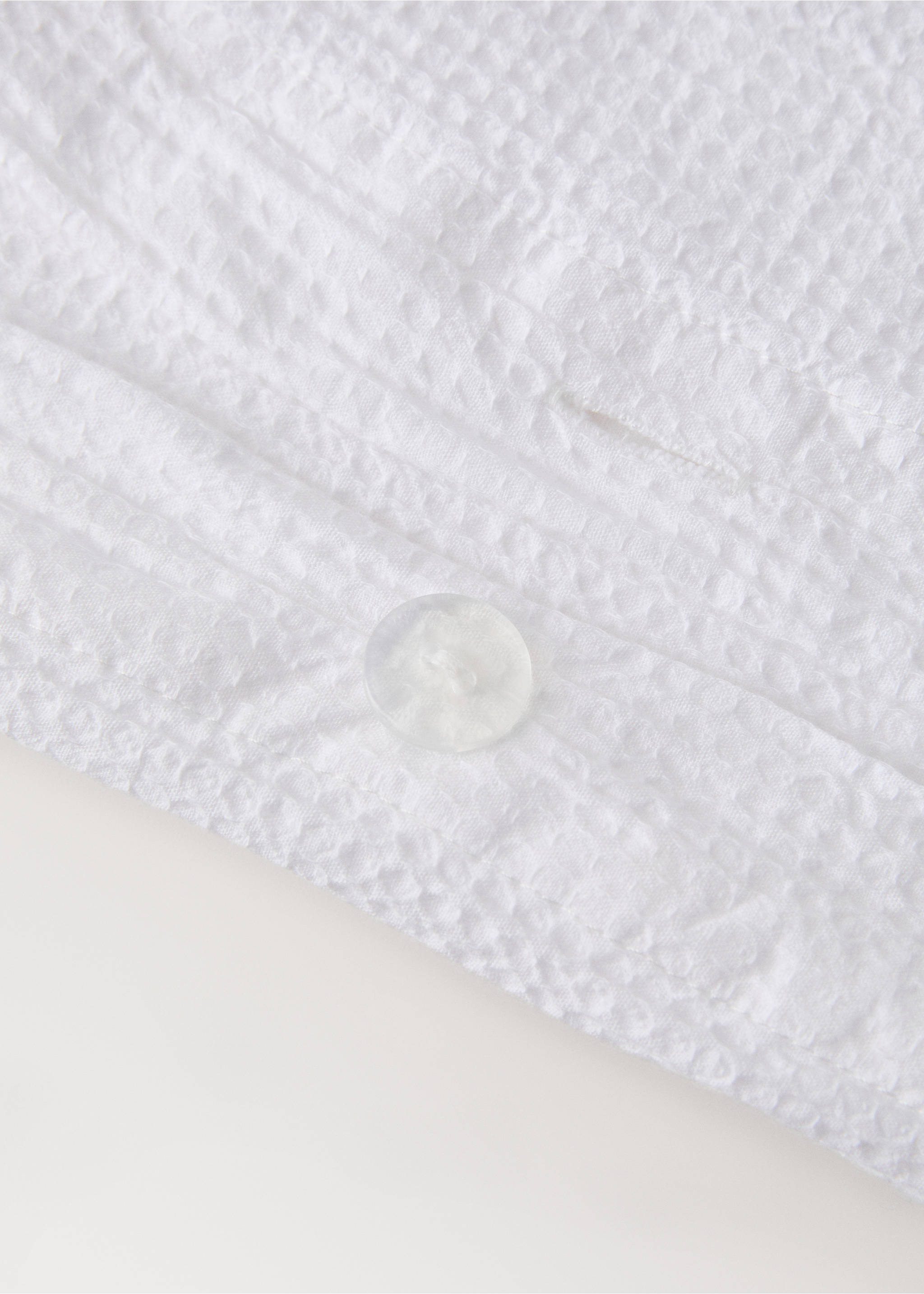 Cotton garment-dyed mini-waffle duvet cover for 180/200 cm bed - Details of the article 2, Off White. Ref: 27063720-00.