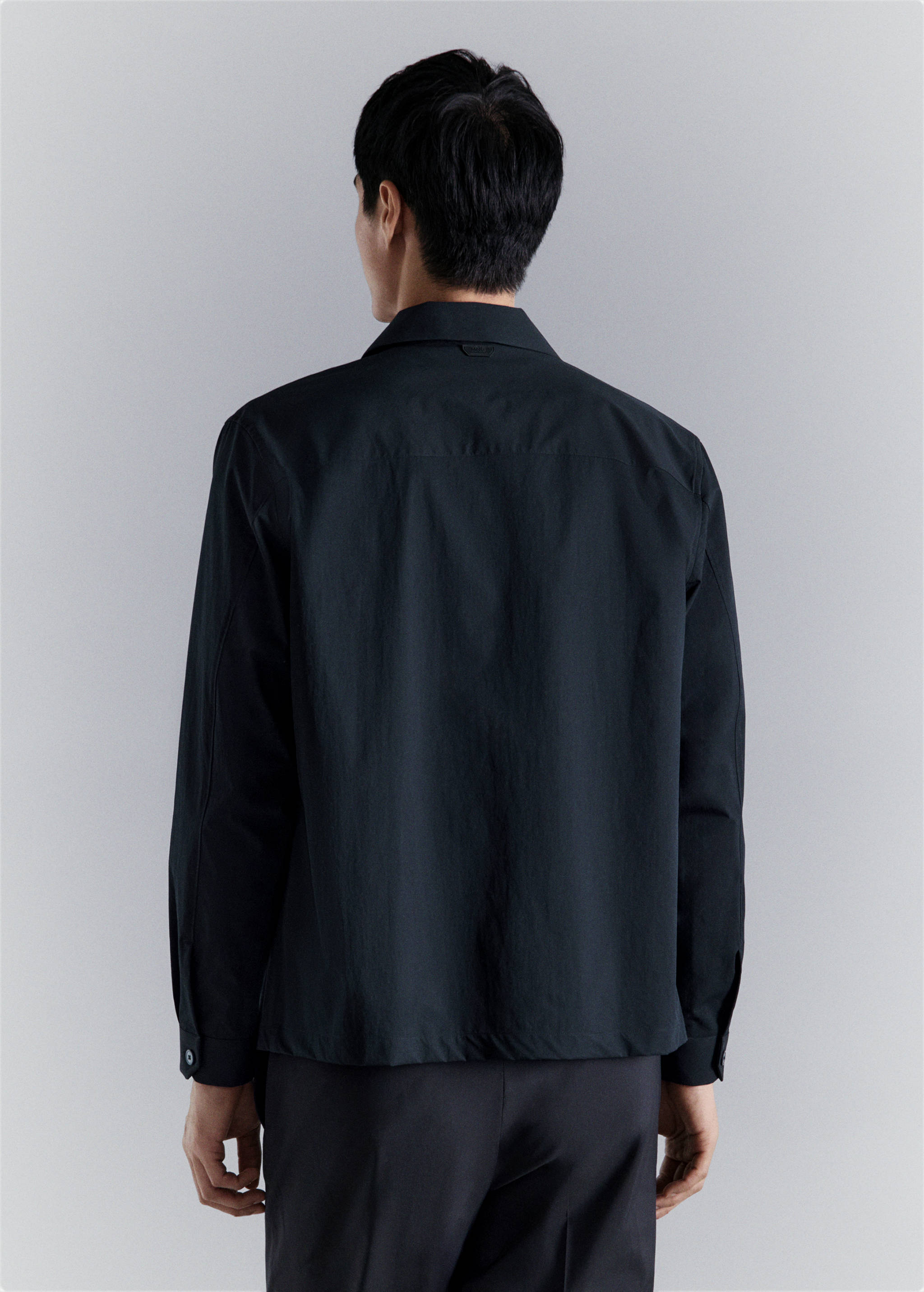 Non-iron overshirt pocket - Reverse of the article