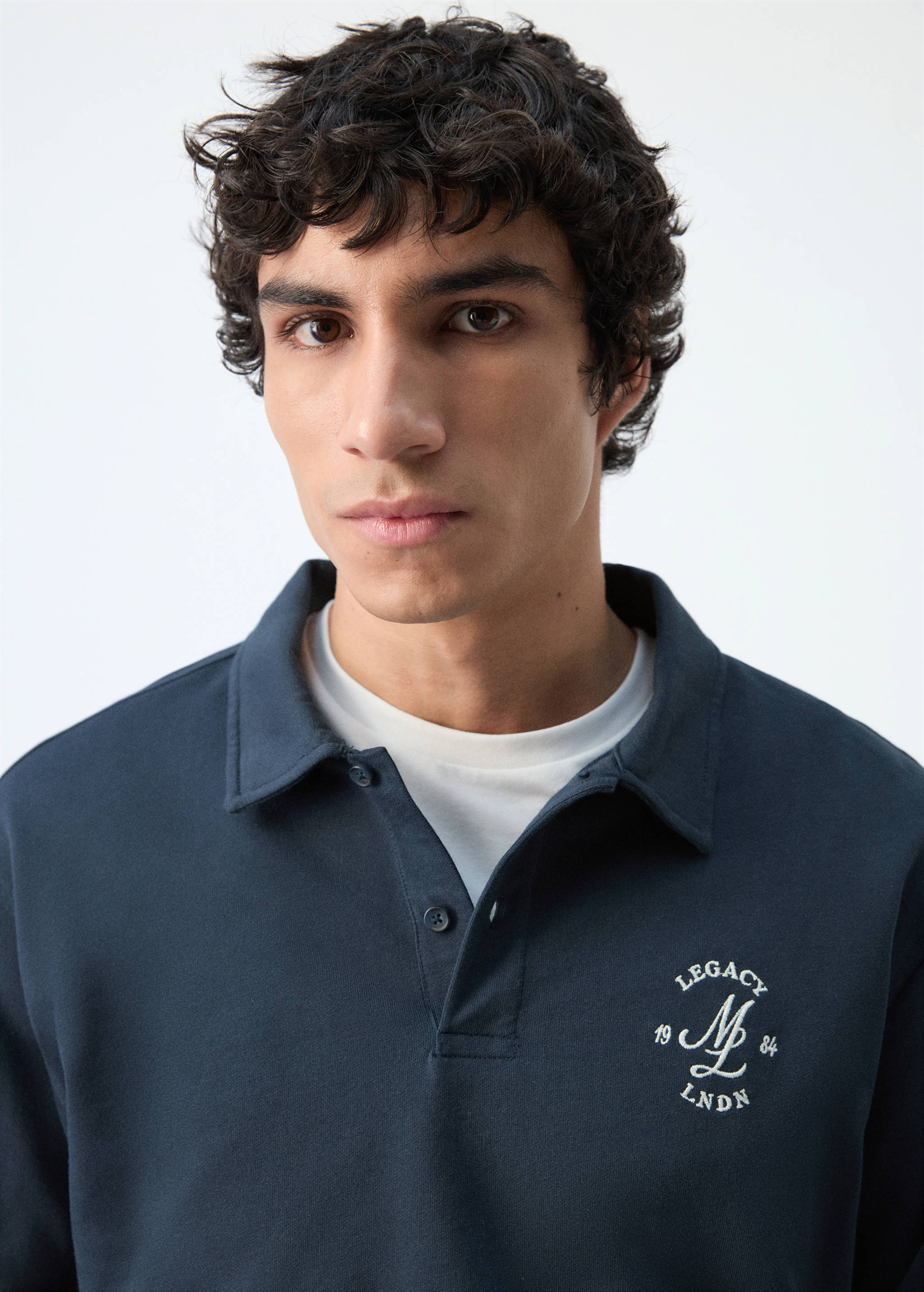 100% cotton polo shirt with graphic embroidery - Details of the article 1