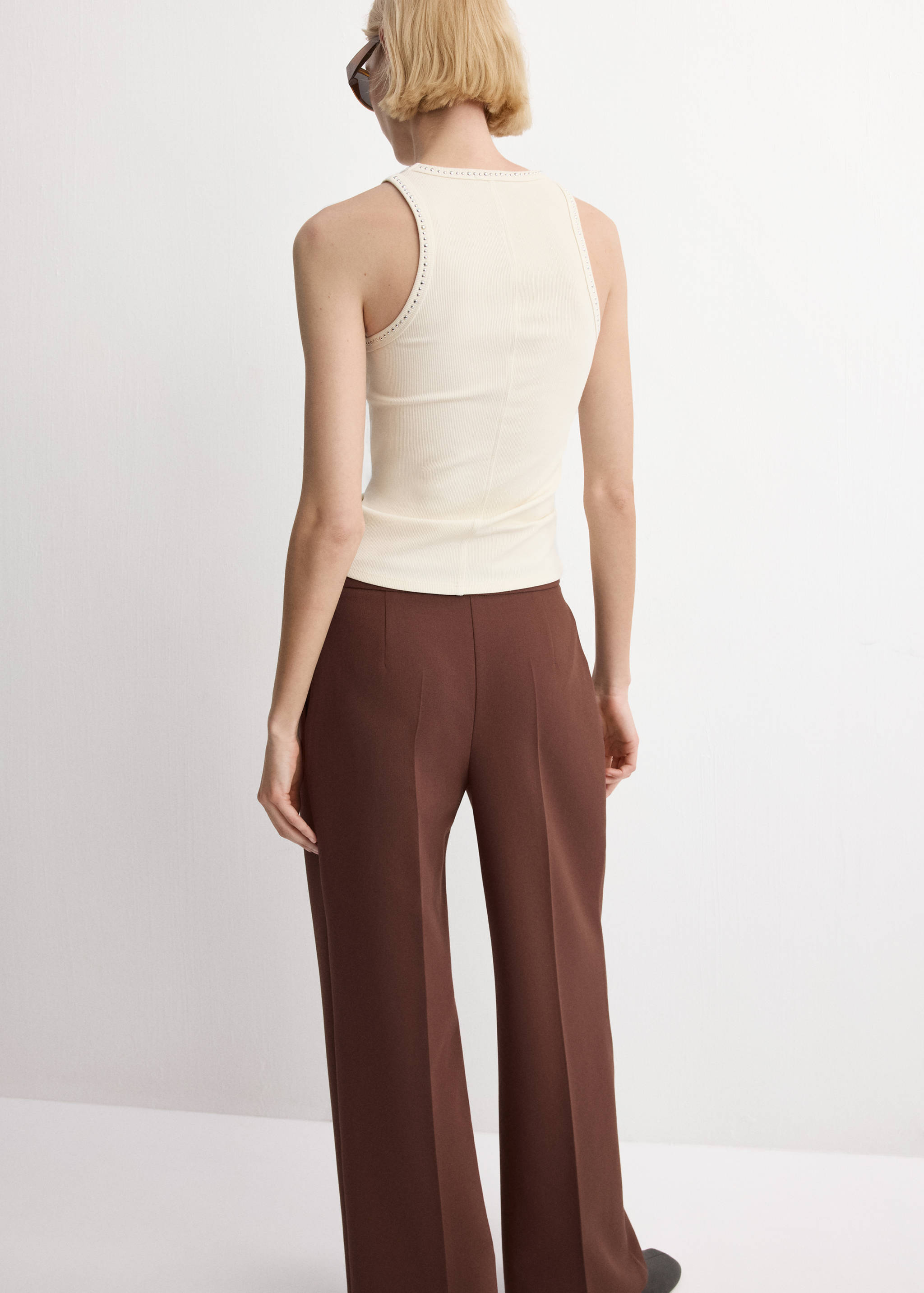 Top ribetes tachuelas - Reverso del artículo