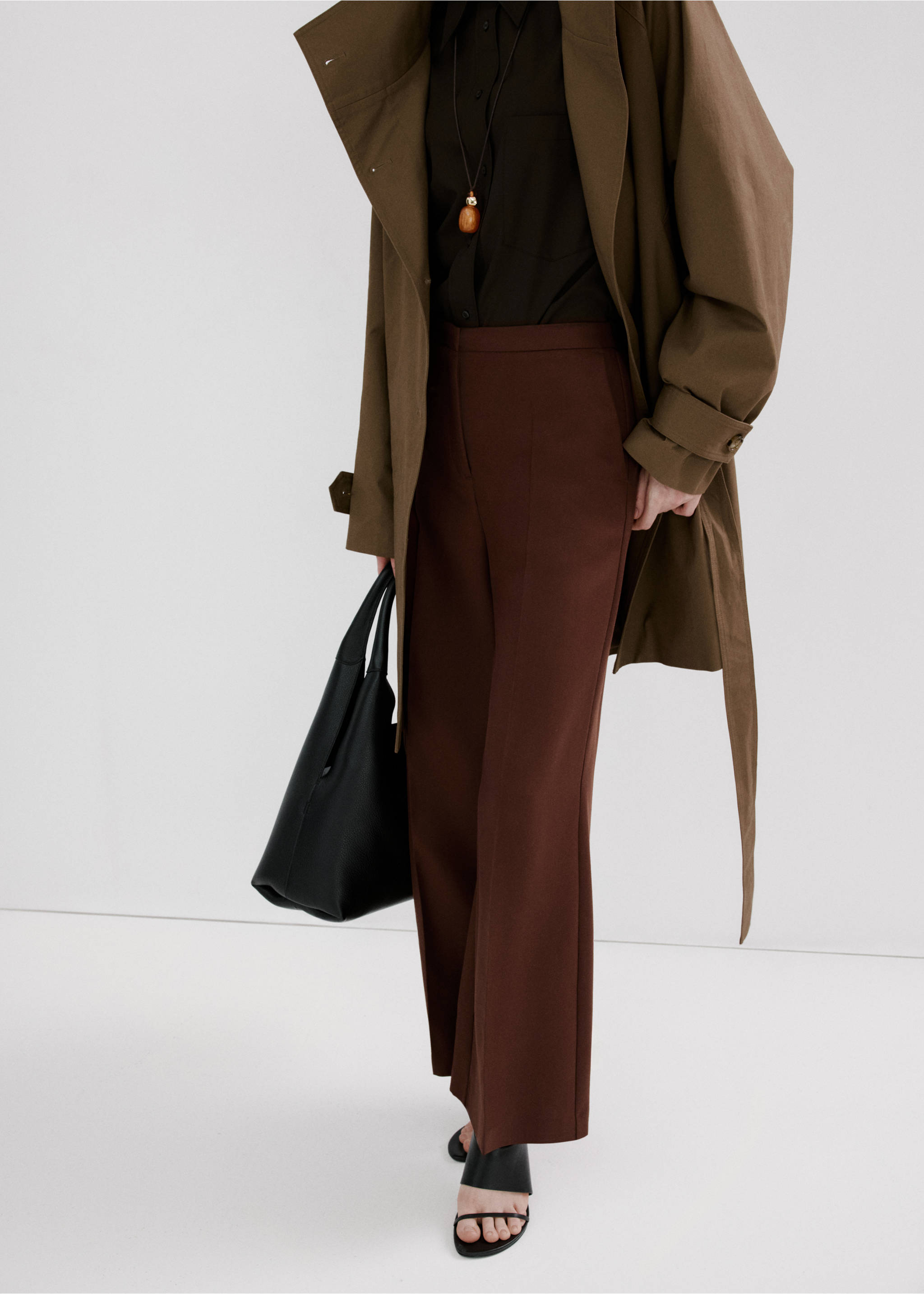 High-waisted lyocell trousers - Details of the article 6, Burnt Orange. Ref: 27065964-00.