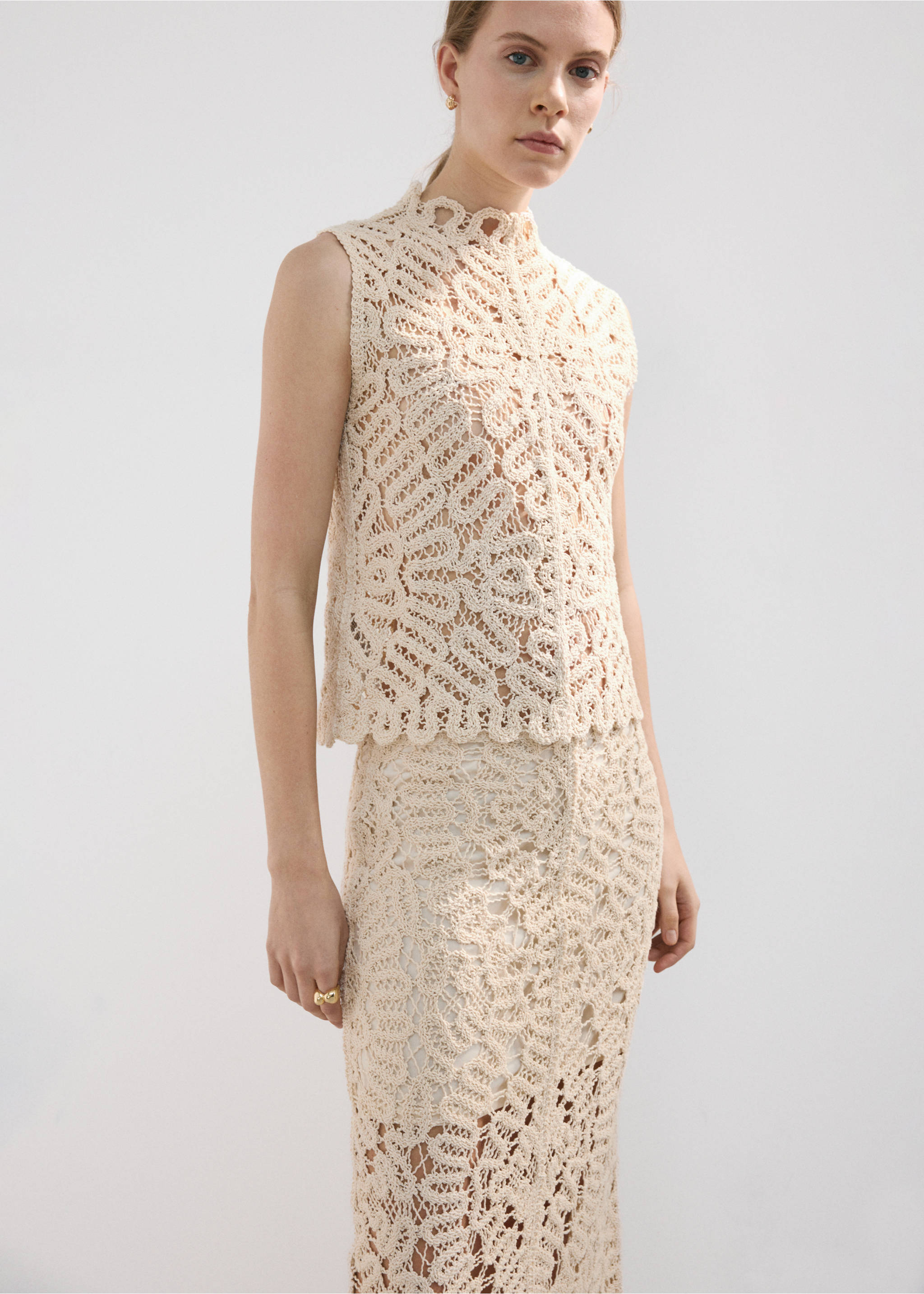 Openwork knitted skirt - Details of the article 1, Sand. Ref: 27067144-00.